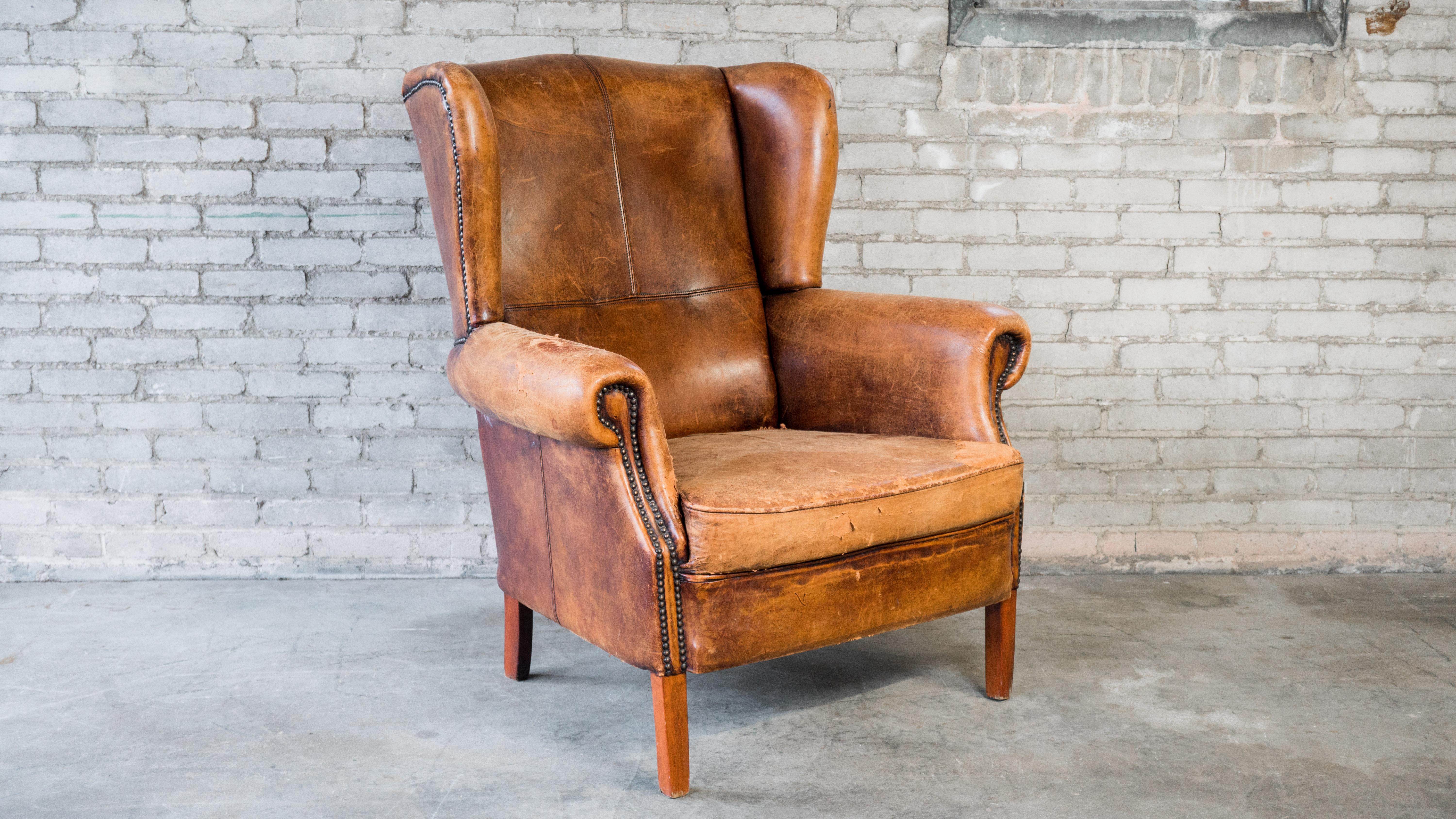 Unknown 1970s Vintage Art Deco Distressed Leather Wingback Chair