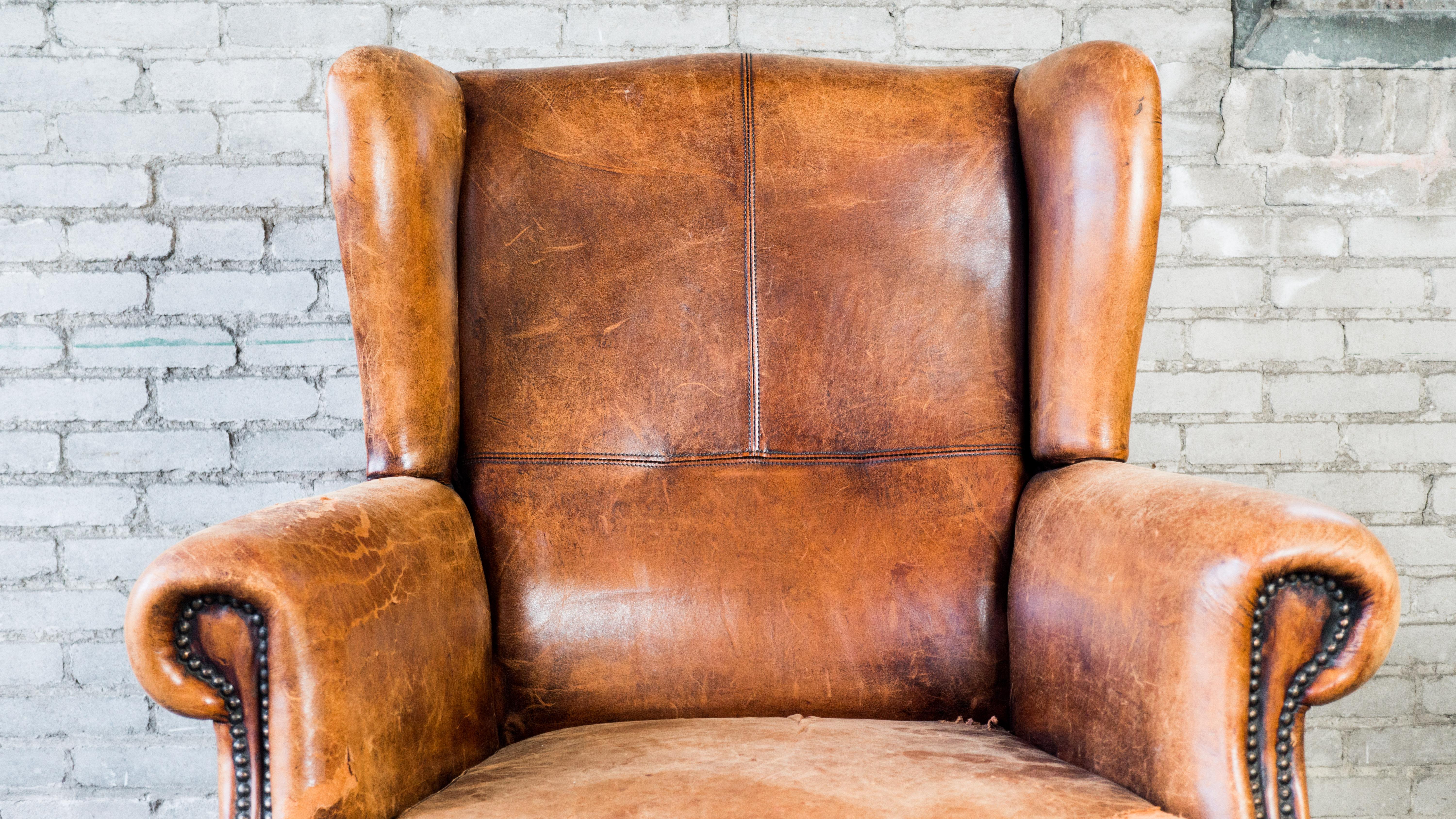 1970s Vintage Art Deco Distressed Leather Wingback Chair In Good Condition In Boston, MA