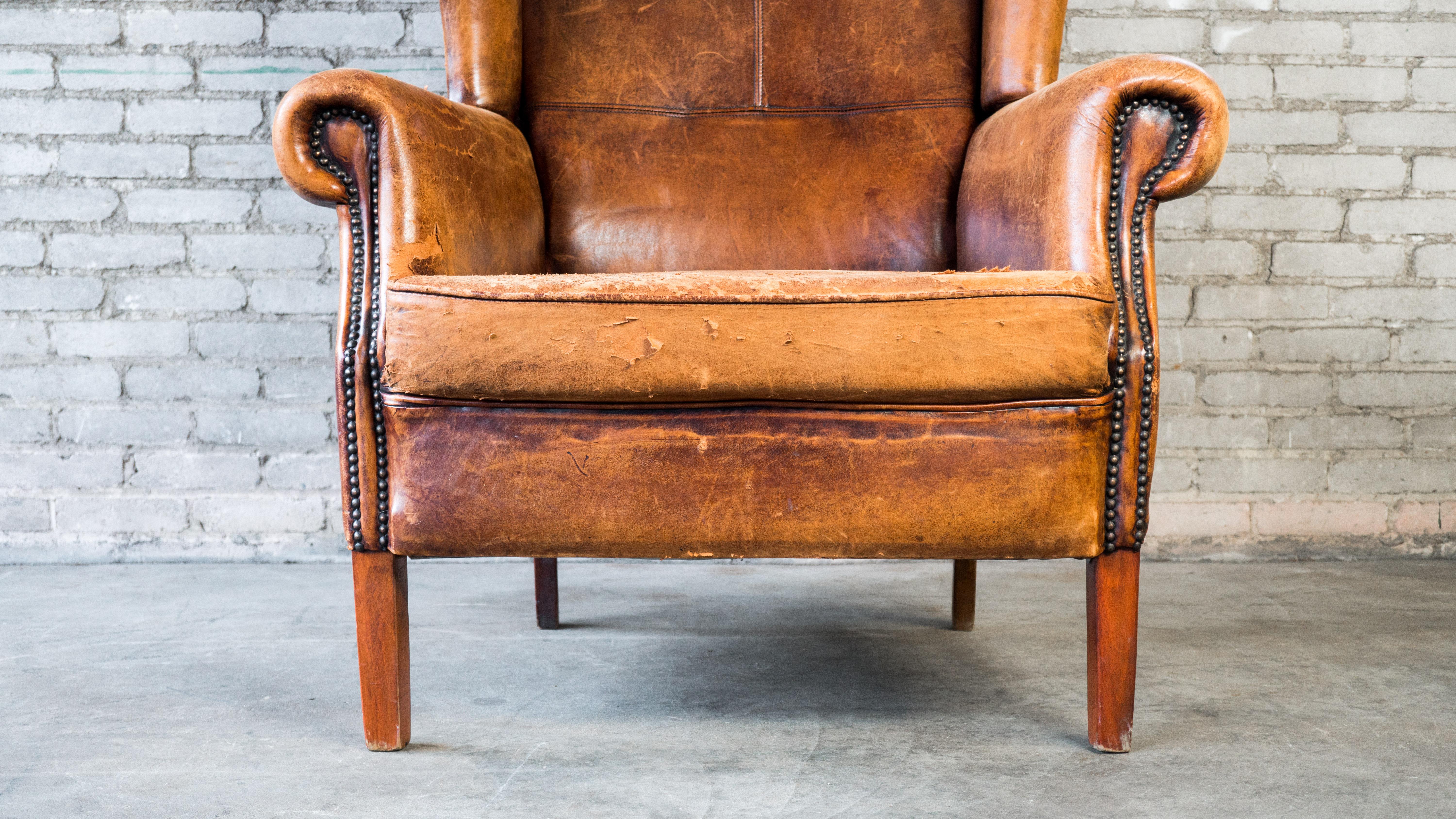 Late 20th Century 1970s Vintage Art Deco Distressed Leather Wingback Chair