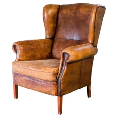 1970s Retro Art Deco Distressed Leather Wingback Chair