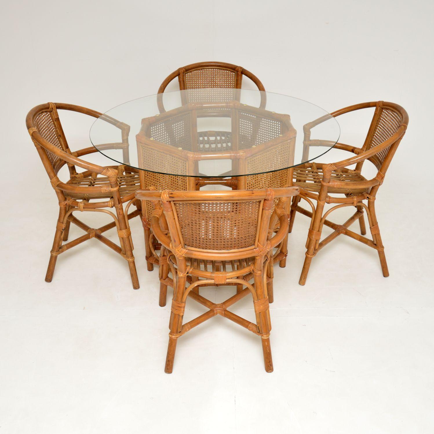 A wonderful original vintage dining / kitchen table and chairs in bamboo and rattan, with a circular glass top. These were made in England, they date from the 1970’s.
They are beautifully made and are of lovely quality. The set is a practical and