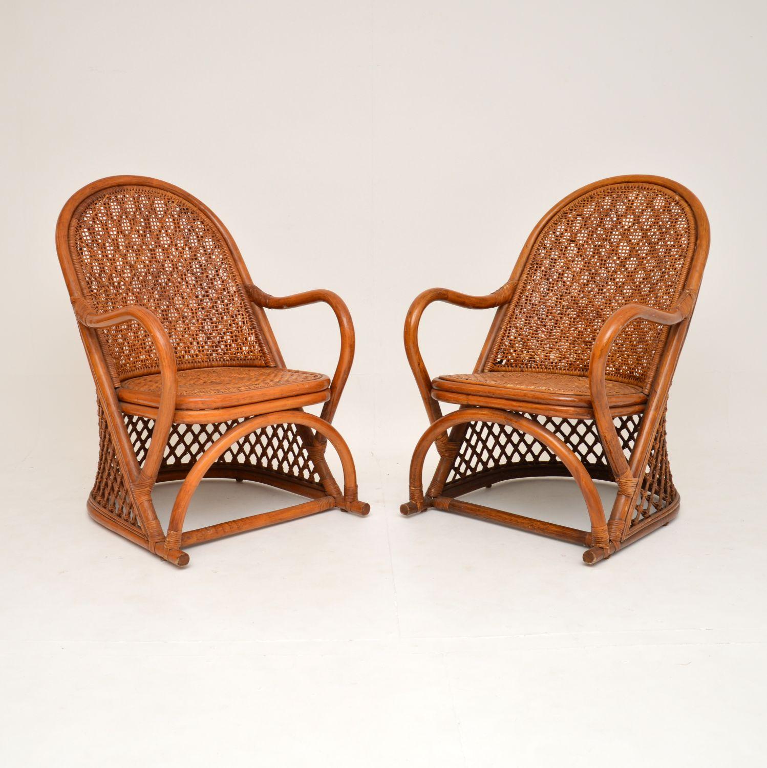 A stylish and very well 1970’s vintage bamboo & rattan pair of armchairs, coffee & side table, which were made in England.

The set consists of a beautiful and very comfortable pair of armchairs, large circular coffee table and smaller side