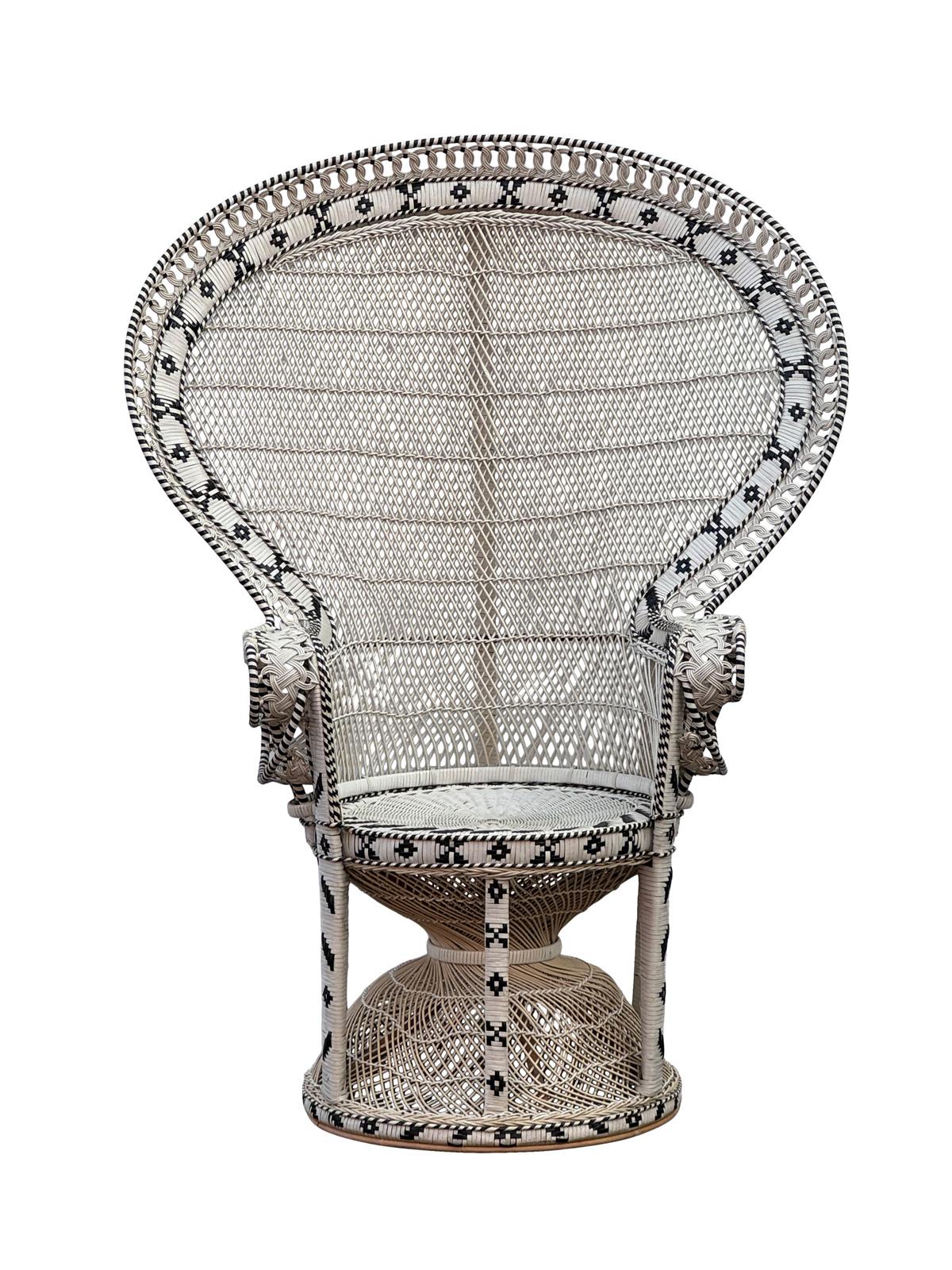 Pair of amazing Baker style Grand peacock chairs made out of woven vinyl with rattan frame and details both in great condition 
