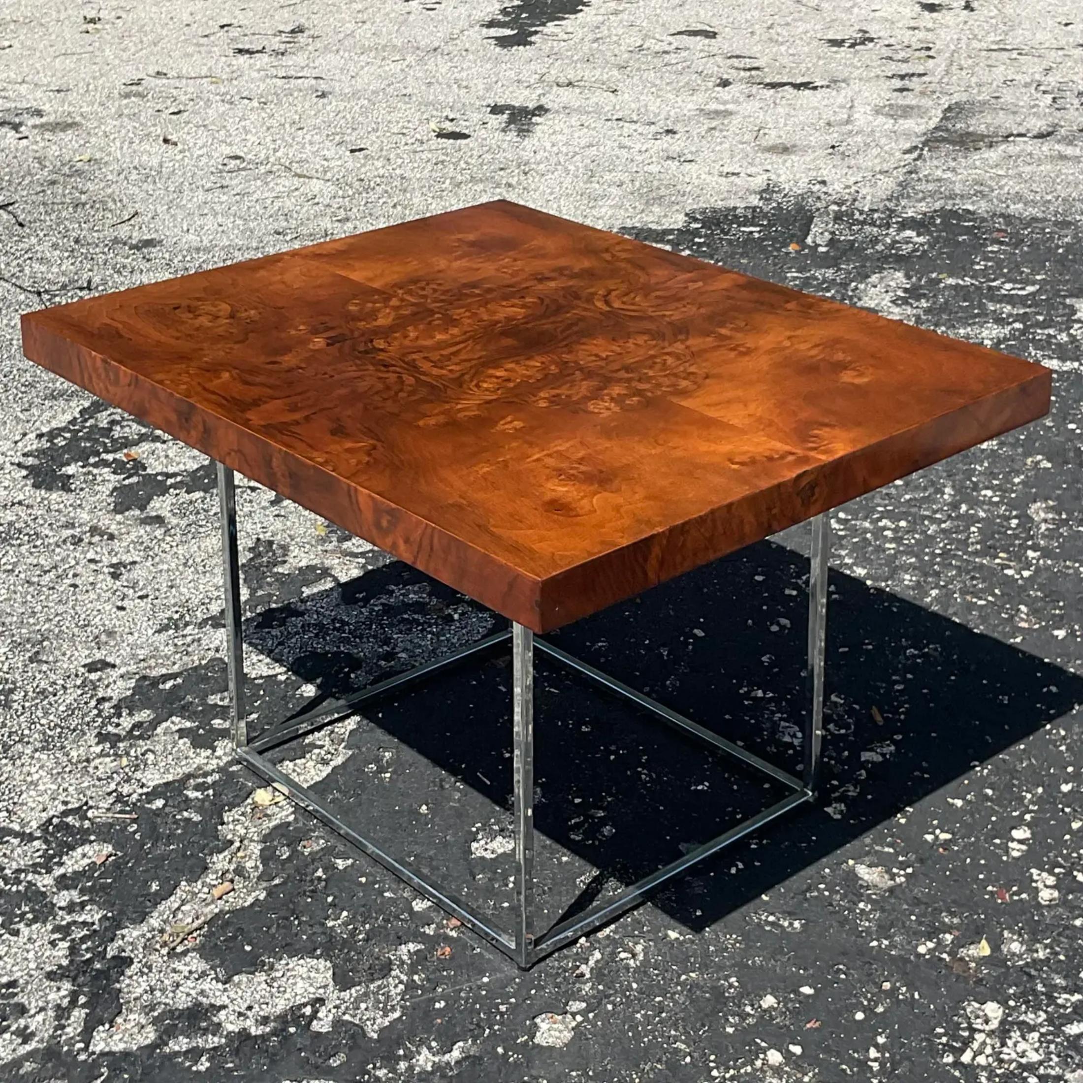 A fabulous vintage Boho coffee table. A chic Burl wood with gorgeous wood grain detail. Rests on a chrome tubular pedestal. Done in the manner of Milo Baughman. Smaller in size so it’s perfect for smaller spaces. Acquired from a Palm Beach estate.