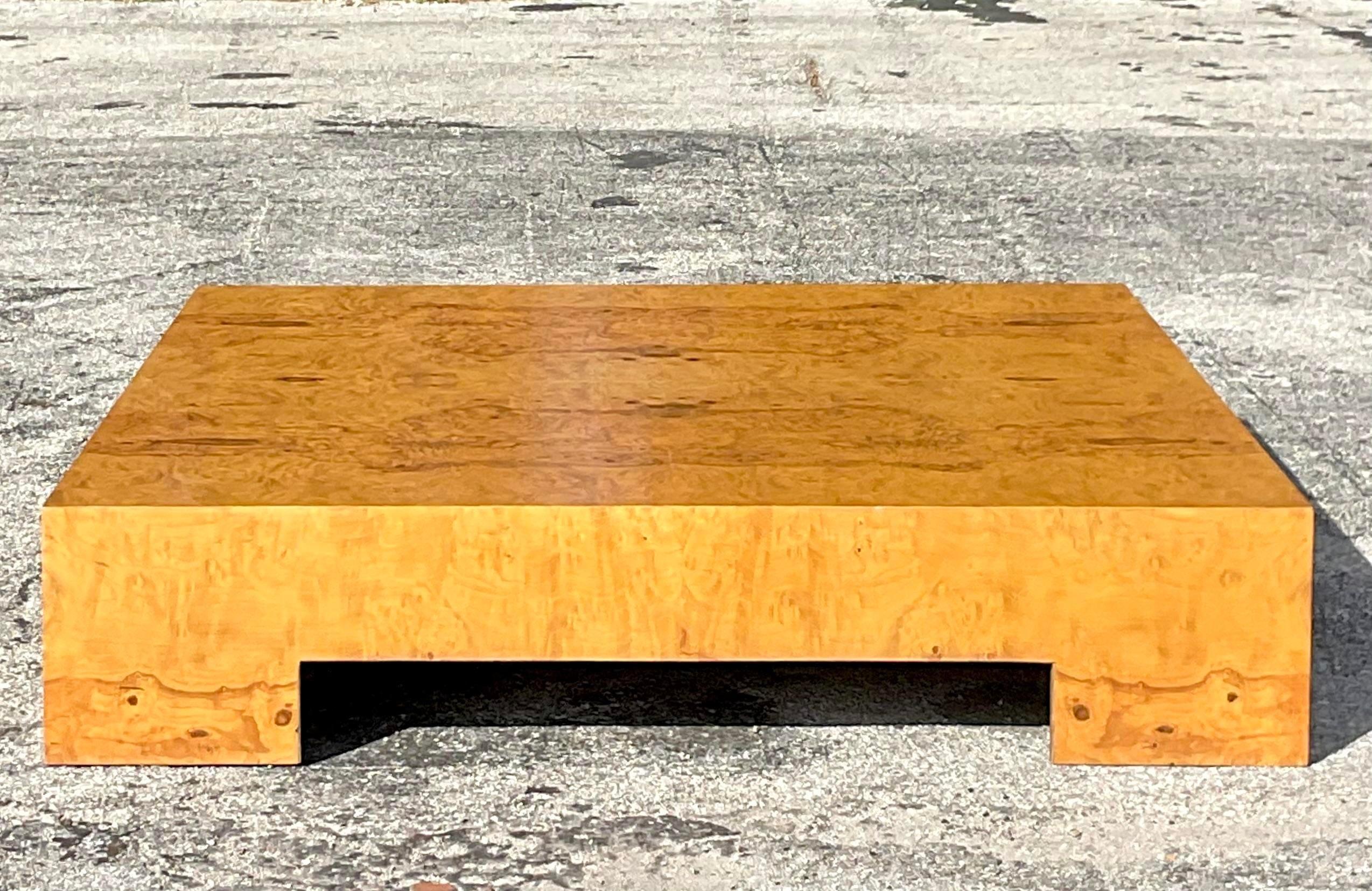 An exceptional vintage Boho coffee table. Done After Milo Baughman for Thayer Coggin. Gorgeous wood grain detail with a clean and modern shape. Acquired from a Palm Beach estate.