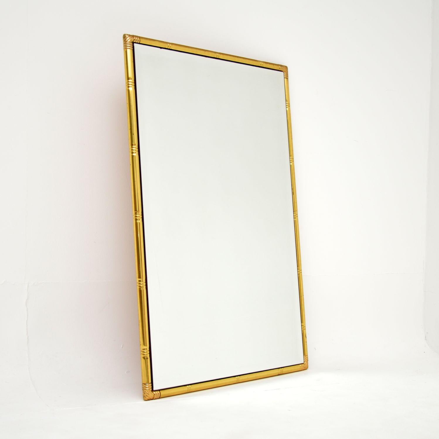 A stylish and extremely well made vintage faux bamboo mirror in solid brass. This was made in England, it dates from the 1970’s.

It is of superb quality, the brass frame is beautifully crafted and is very strong.

The condition is excellent for its