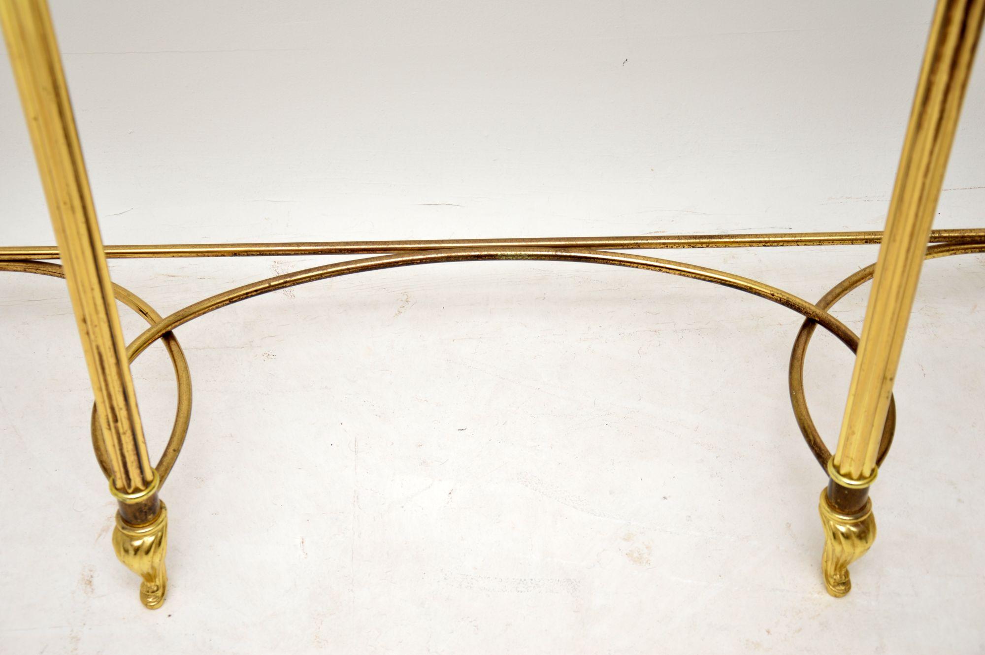 brass and glass console table