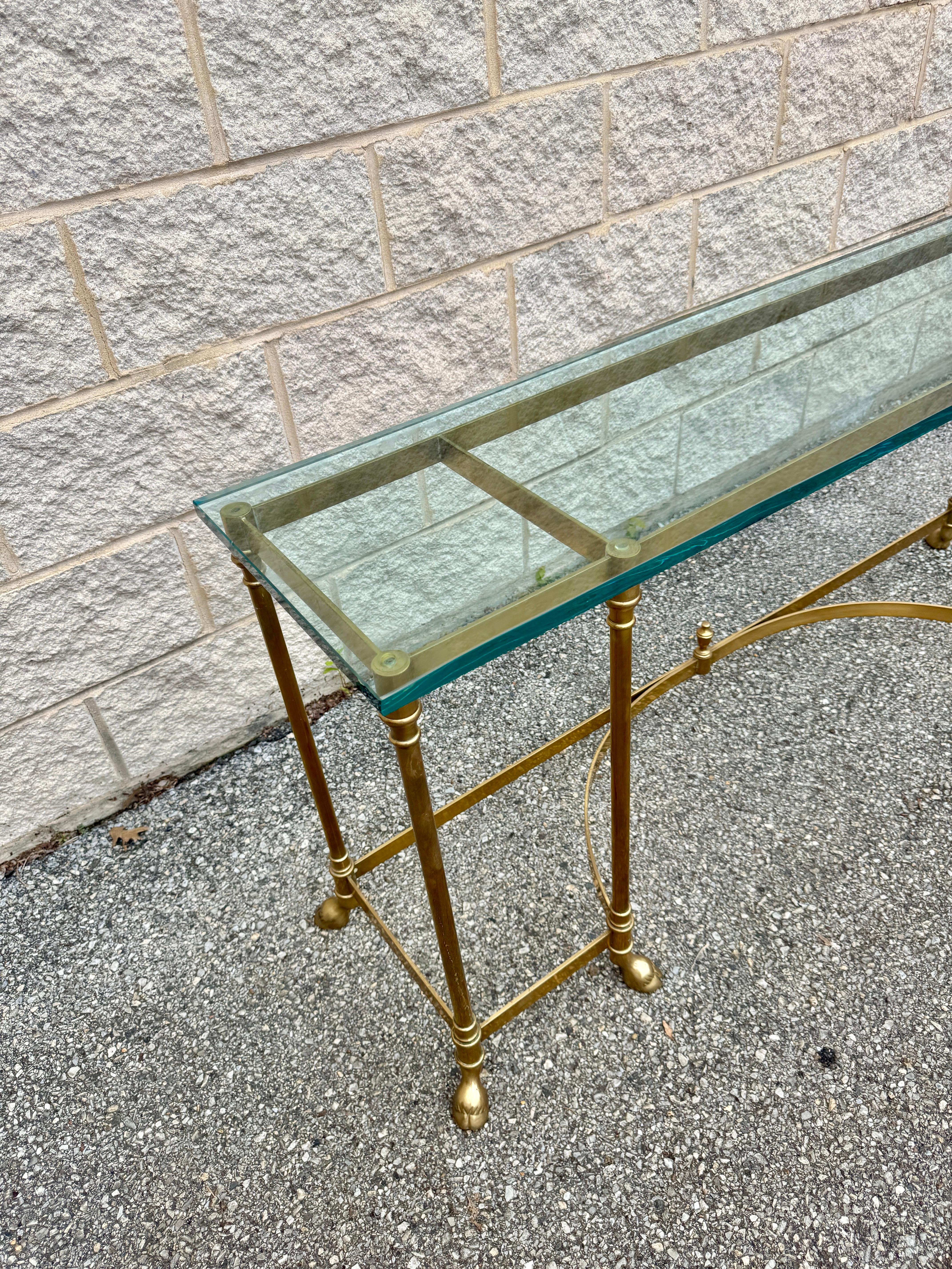 North American 1970s Vintage Brass & Glass Neoclassical Console Table With Hoof Feet For Sale