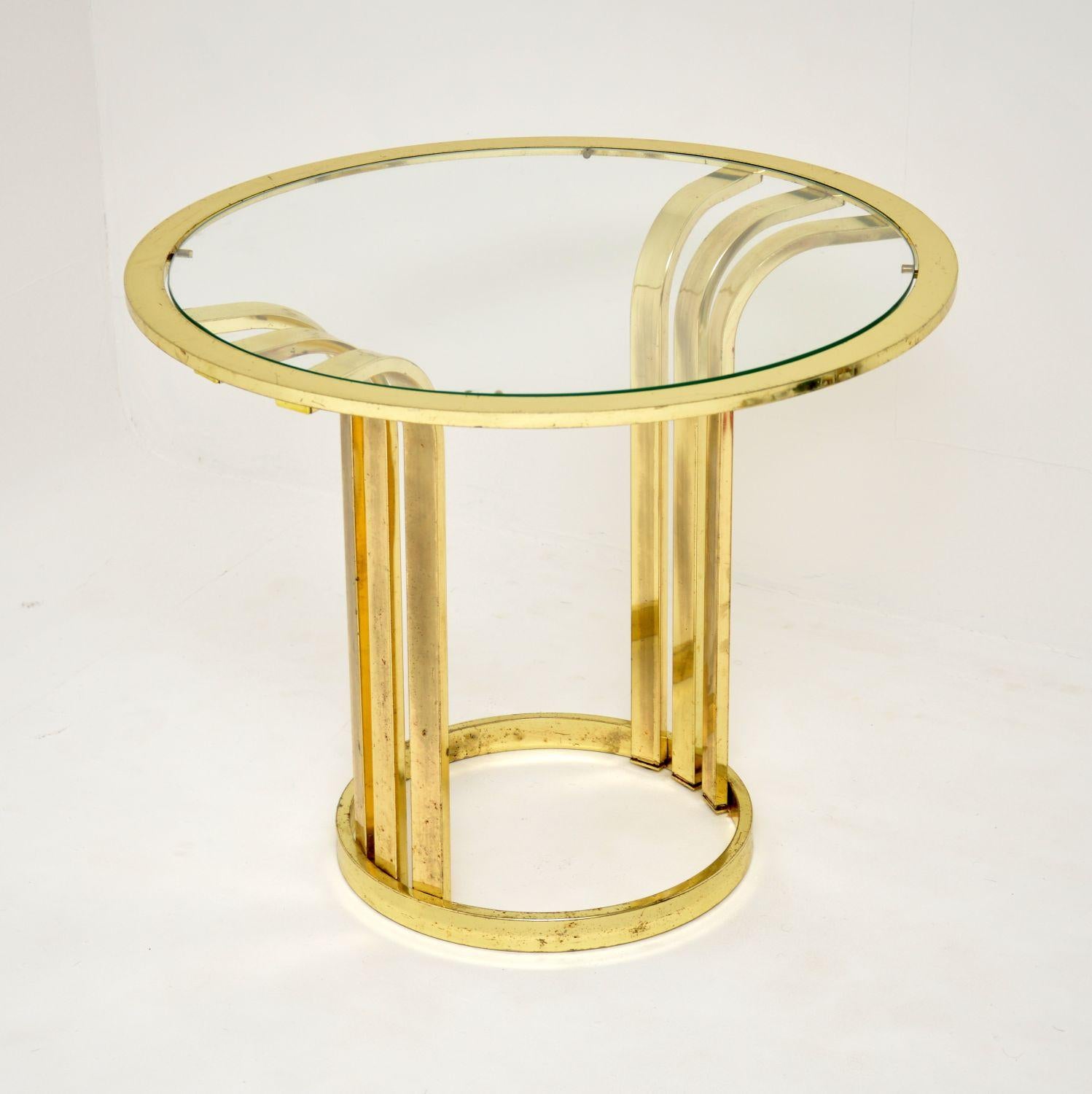 A beautiful Hollywood regency style side table in brass. This was made in England, it dates from the 1970’s.

It is extremely stylish and is a great size, perfect for use as a coffee table or an occasional side table.

The condition is good for