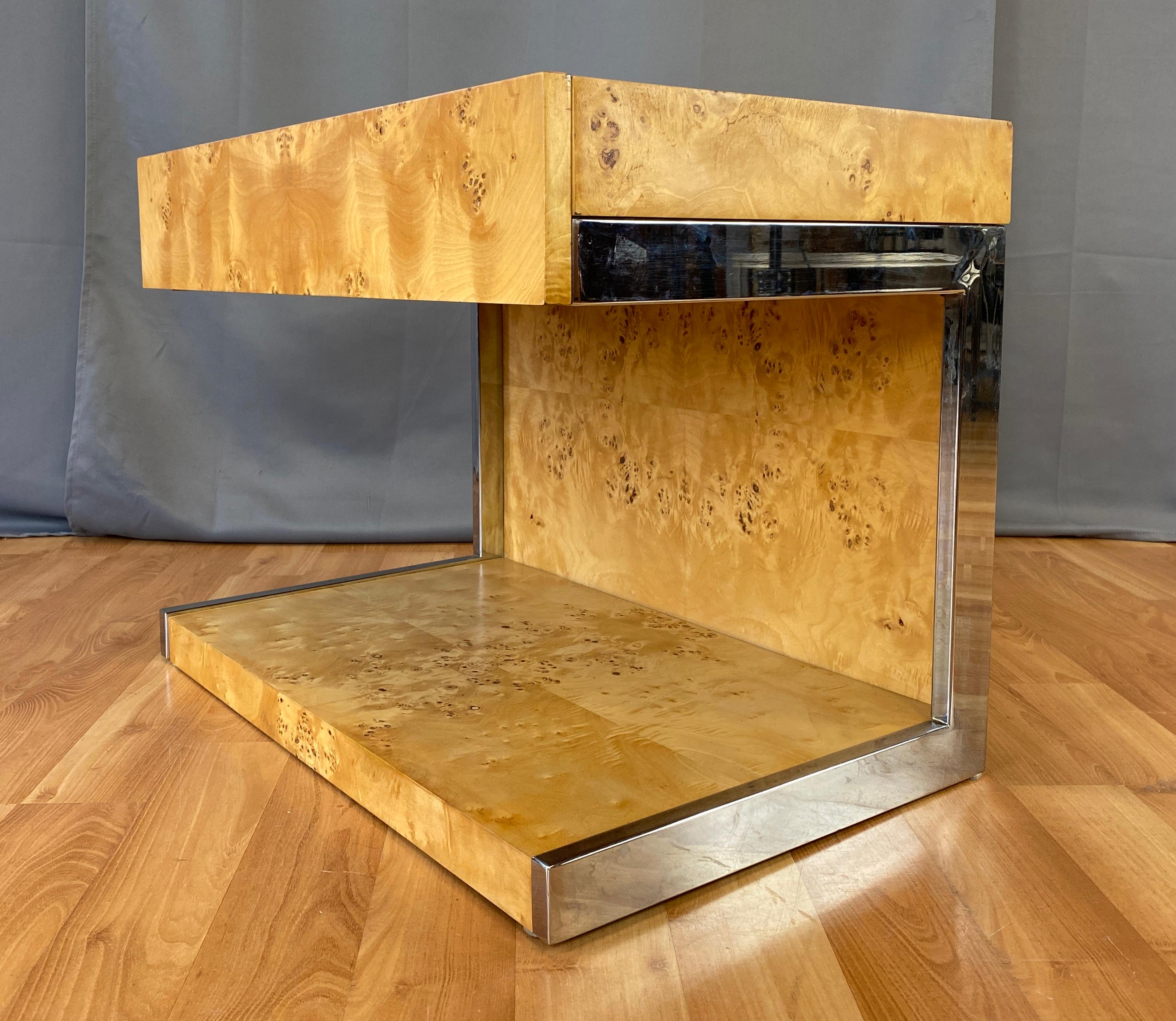 Offered here is a 1970s vintage burl-wood and chrome cantilevered side table, that would make a nice nightstand also.
Has no markings, but it's in the style of Milo Baughman's work for Lane. 
Main body is burl-wood that we believe is Maple, the