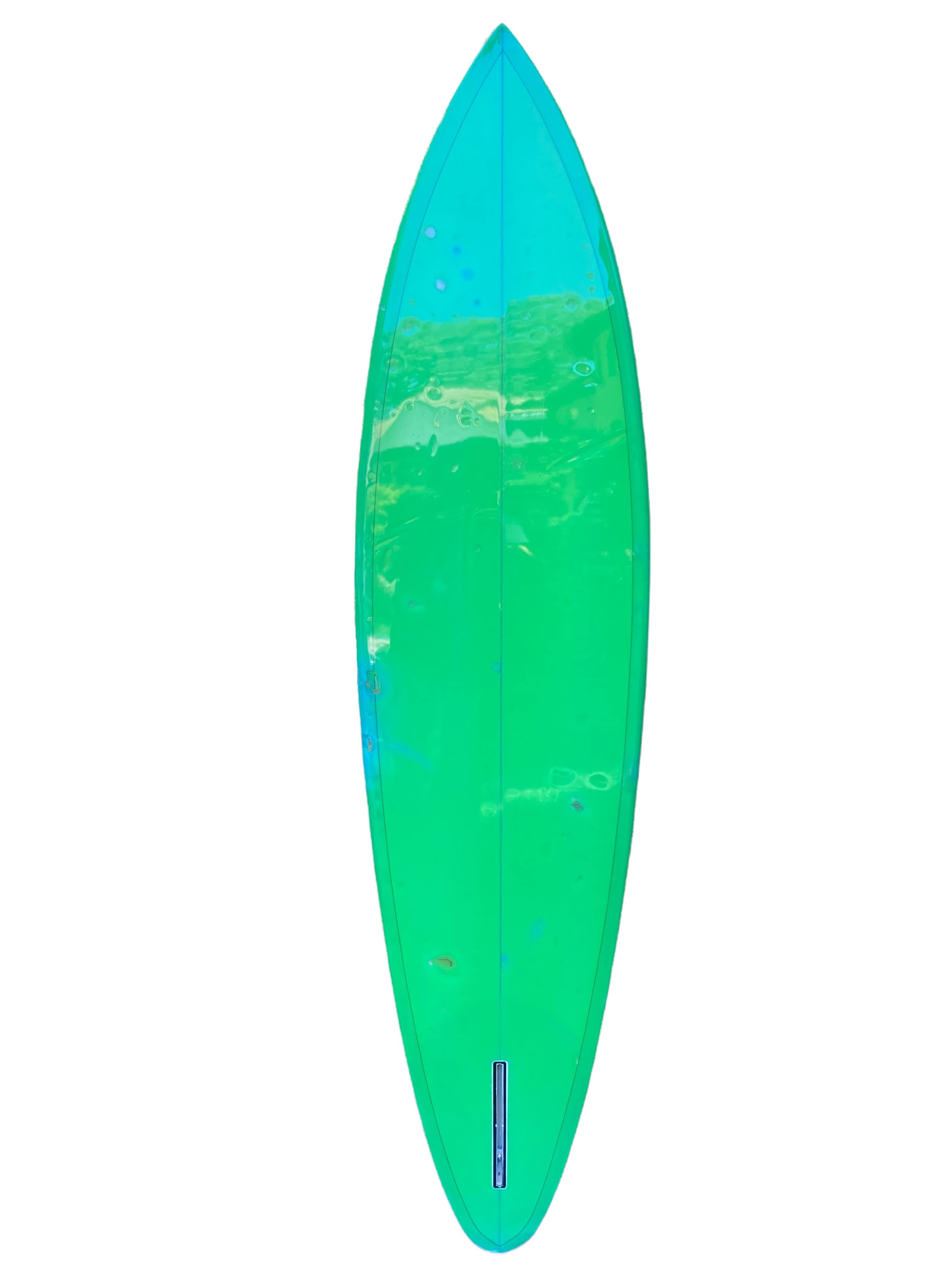 Mid-1970s Vintage Channel Islands single fin surfboard made by Al Merrick. Featuring a gorgeous bright blue tint with seafoam green bottom and wrapped rails. A great example of an all original 1970s surfboard hand shaped by one of the most