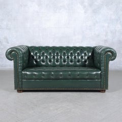 1970s Vintage Chesterfield Sofa: Emerald Green Leather with Elegant Carved Legs