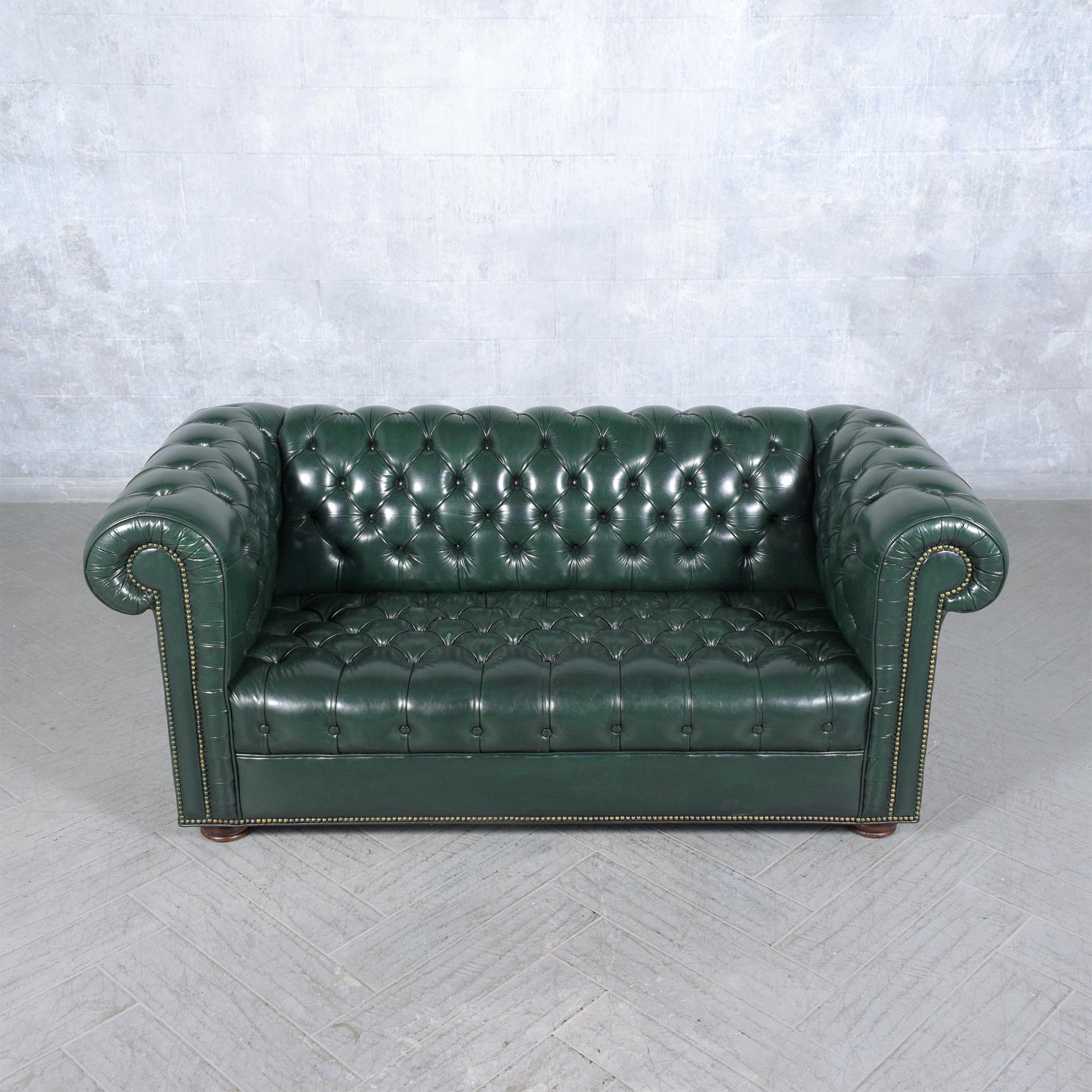 Mid-20th Century 1970s Vintage Chesterfield Sofa: Emerald Green Leather with Elegant Carved Legs