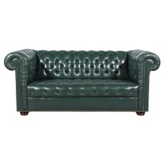 1970s Retro Chesterfield Sofa: Emerald Green Leather with Elegant Carved Legs