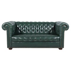 1970s Vintage Chesterfield Sofa: Emerald Green Leather with Elegant Carved Legs