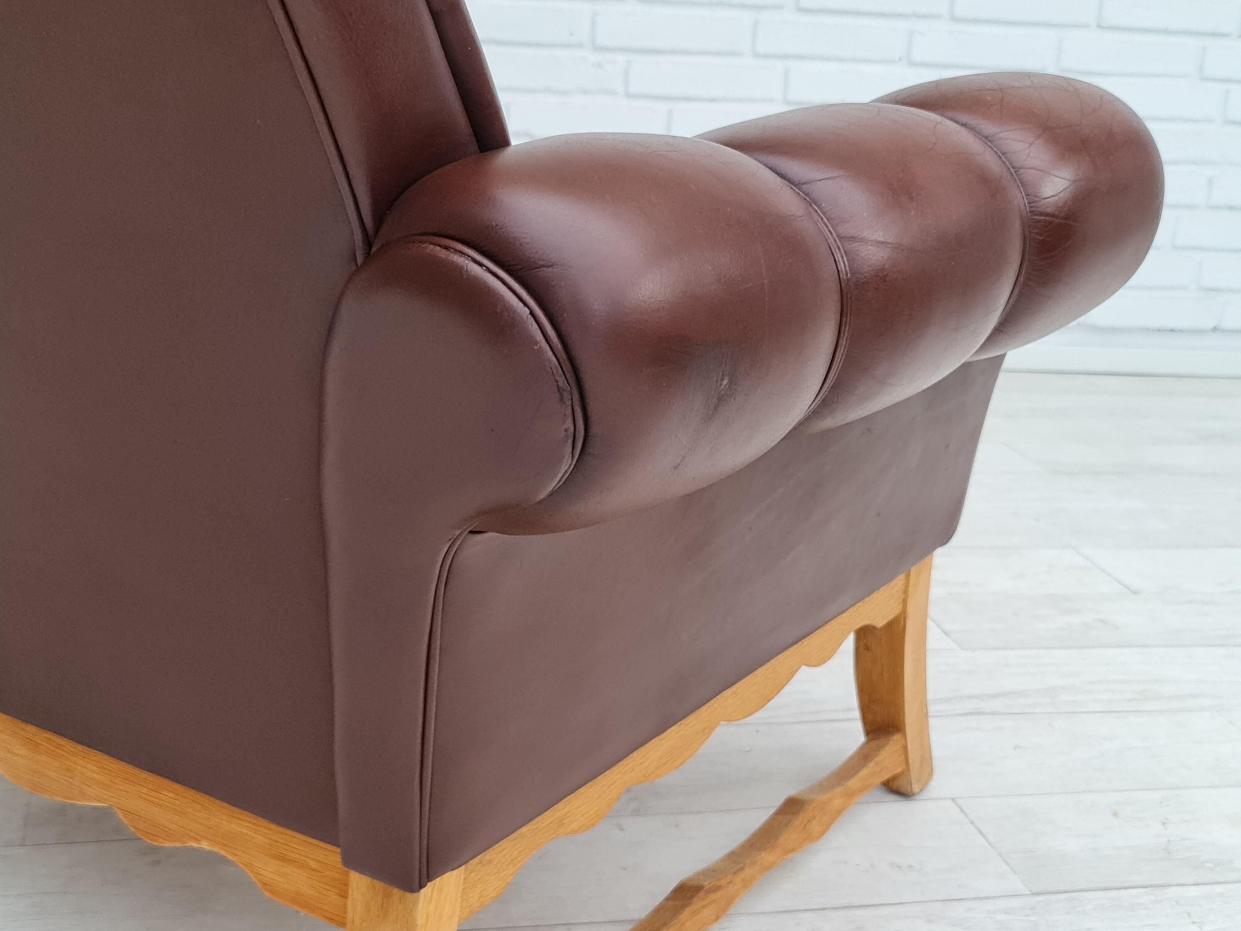 Scandinavian Modern 1970s, vintage Danish highback armchair, leather, oak wood For Sale