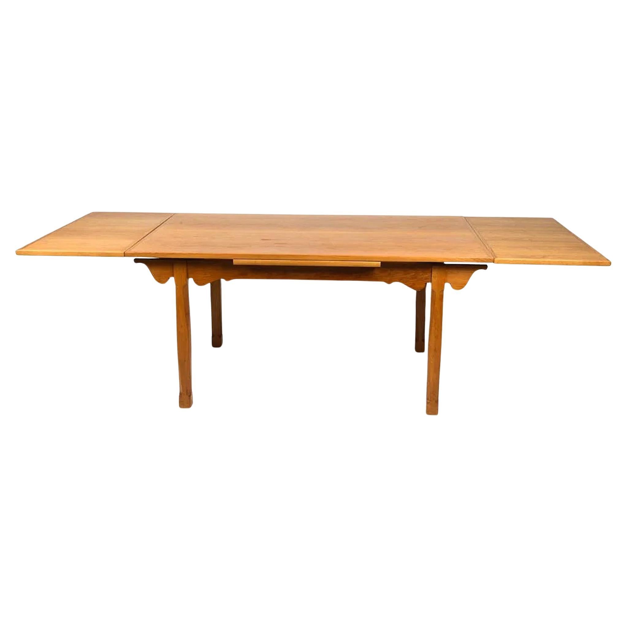 1970s Vintage Danish Oak Extending Dining Table in Manner of Henning Kjærnulf For Sale