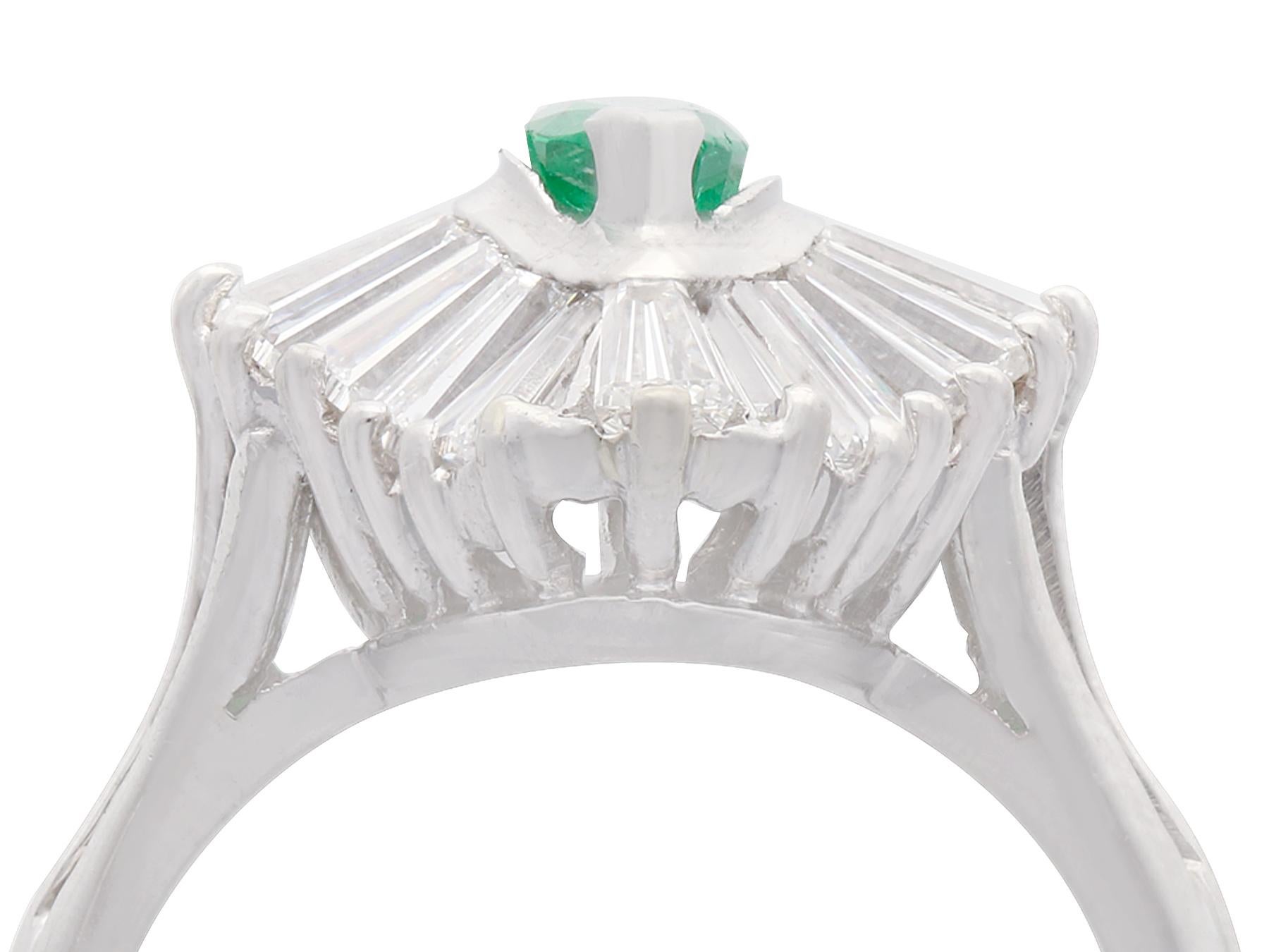 An impressive vintage 1970s 0.60 carat emerald and 1.85 carat diamond, platinum marquise shaped dress ring; part of our diverse gemstone jewelry collections

This fine and impressive marquise emerald and diamond ring has been crafted in