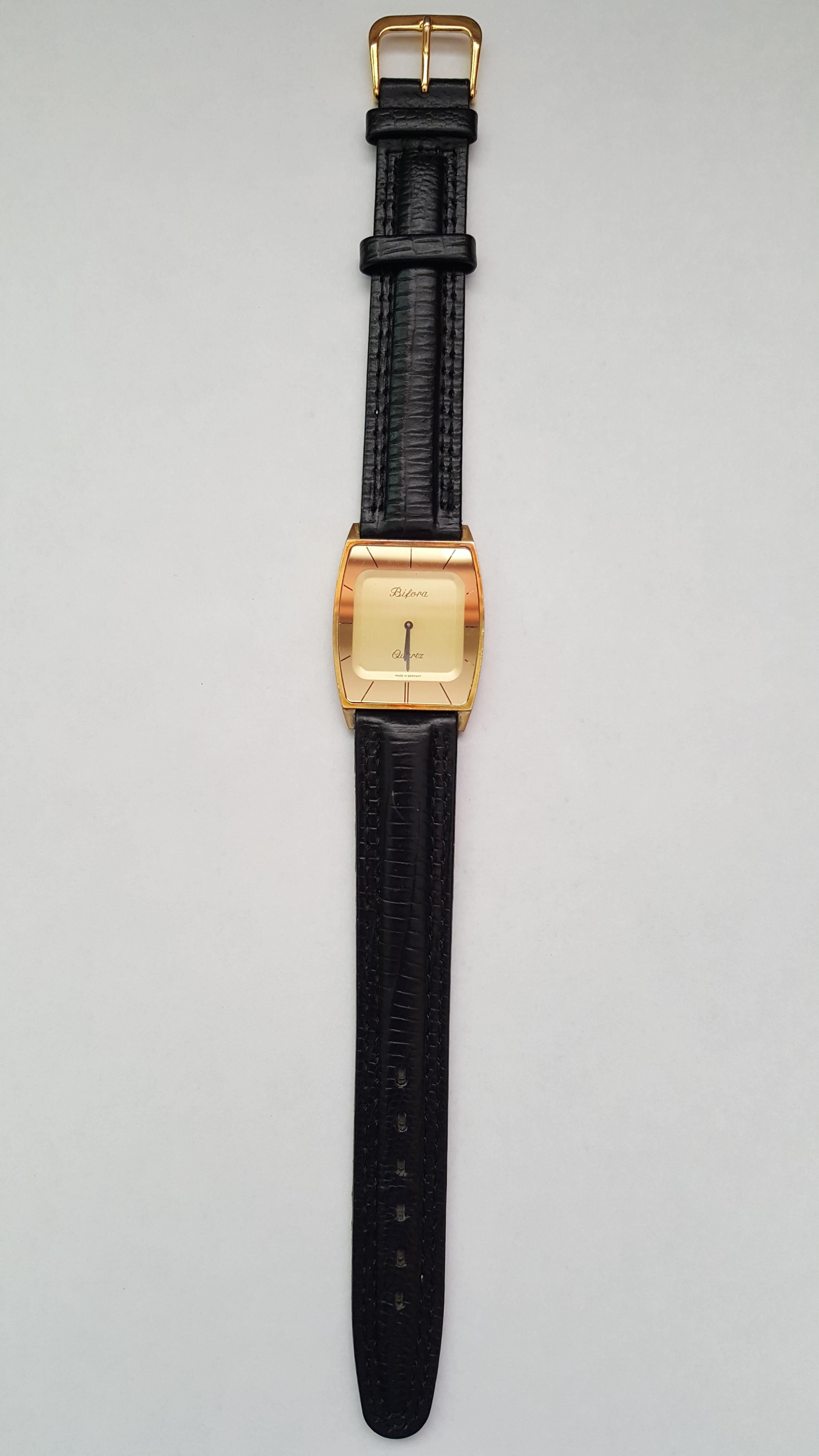 1970s Vintage Flat-Plated Bifora Watch, German Made, Black Leather, Gold Face In Good Condition In Rancho Santa Fe, CA