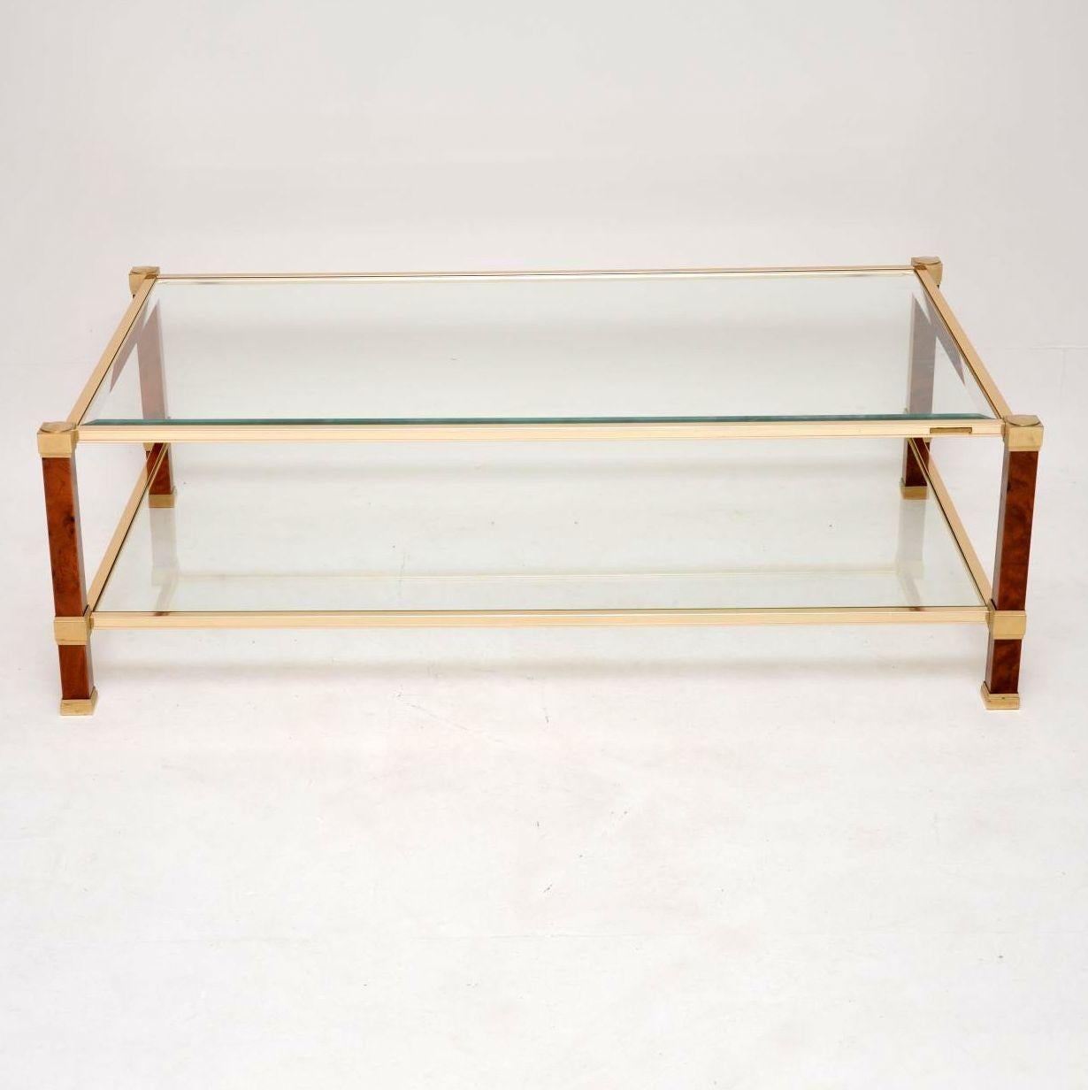 A stunning and very well made vintage coffee table, this was made in France during the 1970’s by Pierre Vandel. It is in superb condition for its age, with hardly any wear to be seen. This has a clear bevelled glass top and also a lower tier for