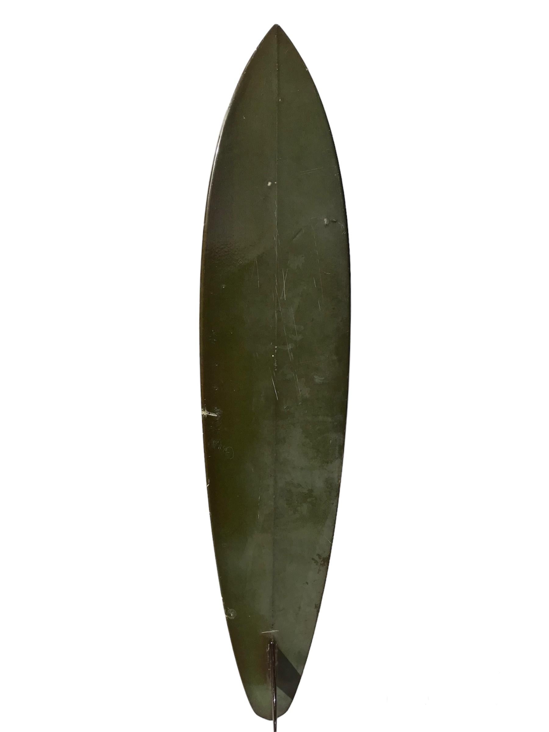 Mid-1970s Vintage Gerry Lopez Lightning Bolt surfboard. Features a vibrant yellow tinted deck with jet-black lightning bolt, ruby red single fin, and diamond tail shape. Originally owned by Gerry Lopez’s friend who played paintball with Gerry and