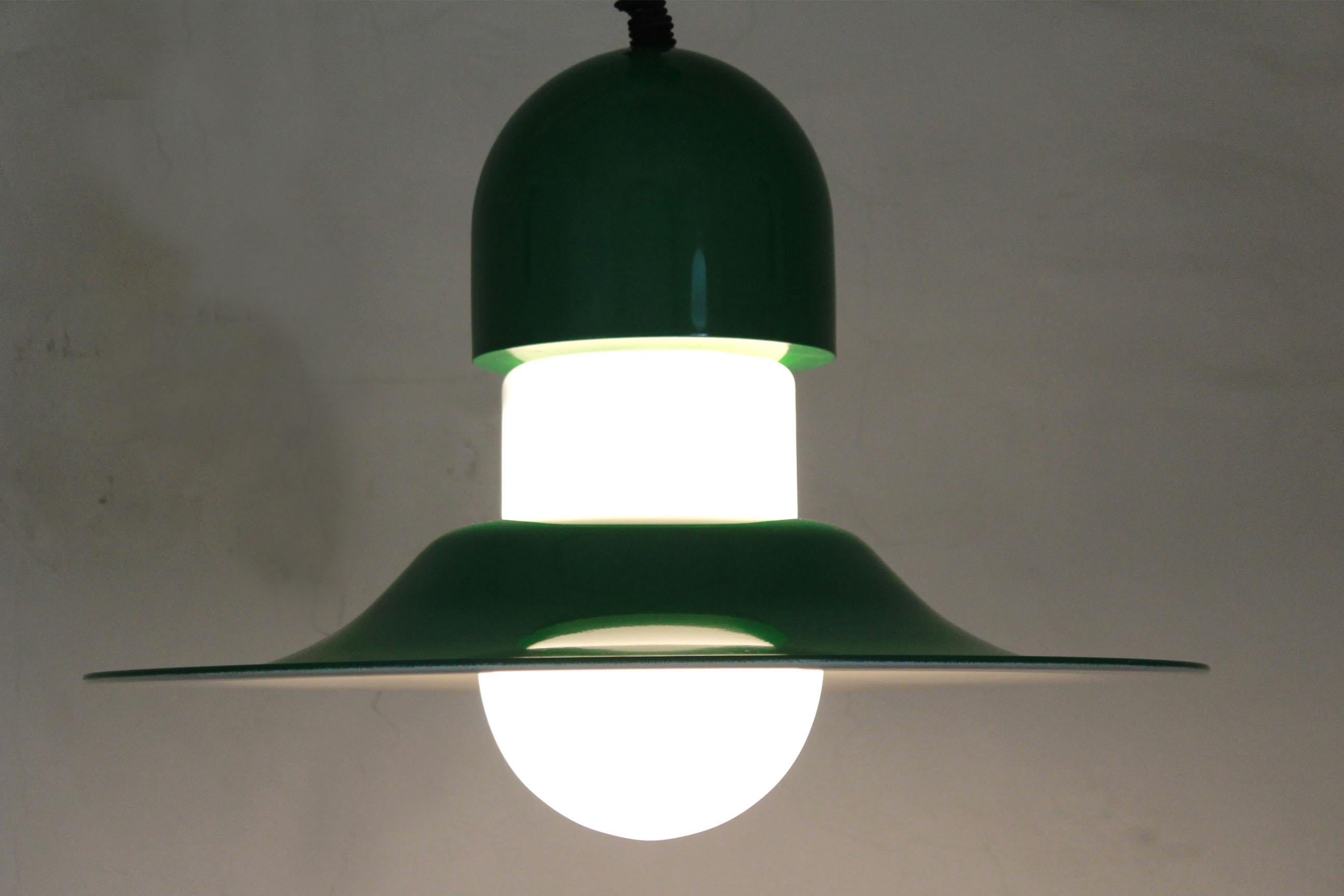 Vintage Green Pendant by Vico Magistretti for Artemide, Italy 1970s
A rare 1970s vintage pendant by Vico Magistretti designer for Artemide. Bicolor structure (white and green) and extendible electrical wire (up to one metre). White opaline glass