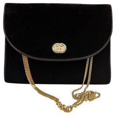 Borsa a tracolla vintage Gucci degli anni '70 in velluto nero con catena a doppio uso