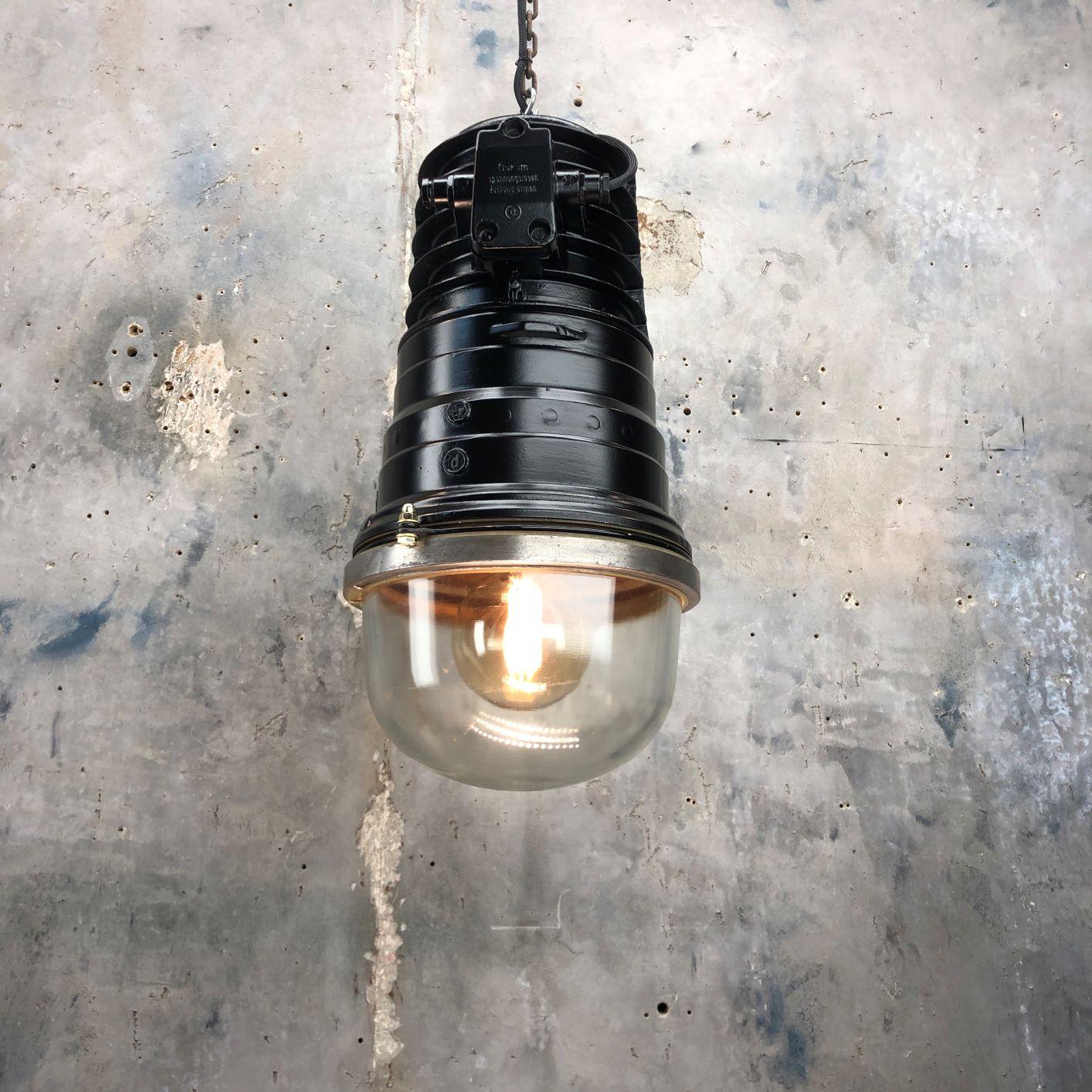A vintage industrial large cast aluminium explosion proof ceiling pendant by EOW fitted with energy saving LED light bulb and painted satin black. 

Reclaimed and professionally restored by Loomlight in UK for modern interiors. 

There are Atex (Ex)