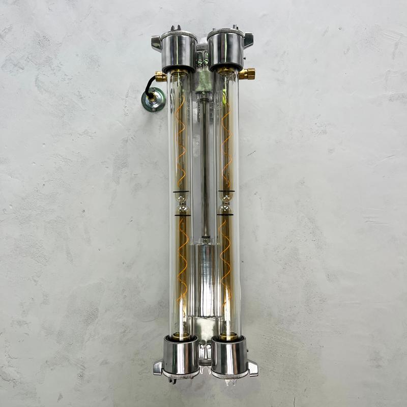 A wall mounted vintage industrial style aluminum flameproof strip light fitted with Edison LED tubes made by Daeyang in the 1970's.

These original strip lights have been reclaimed from decommissioned cargo ships. We professionally restore each