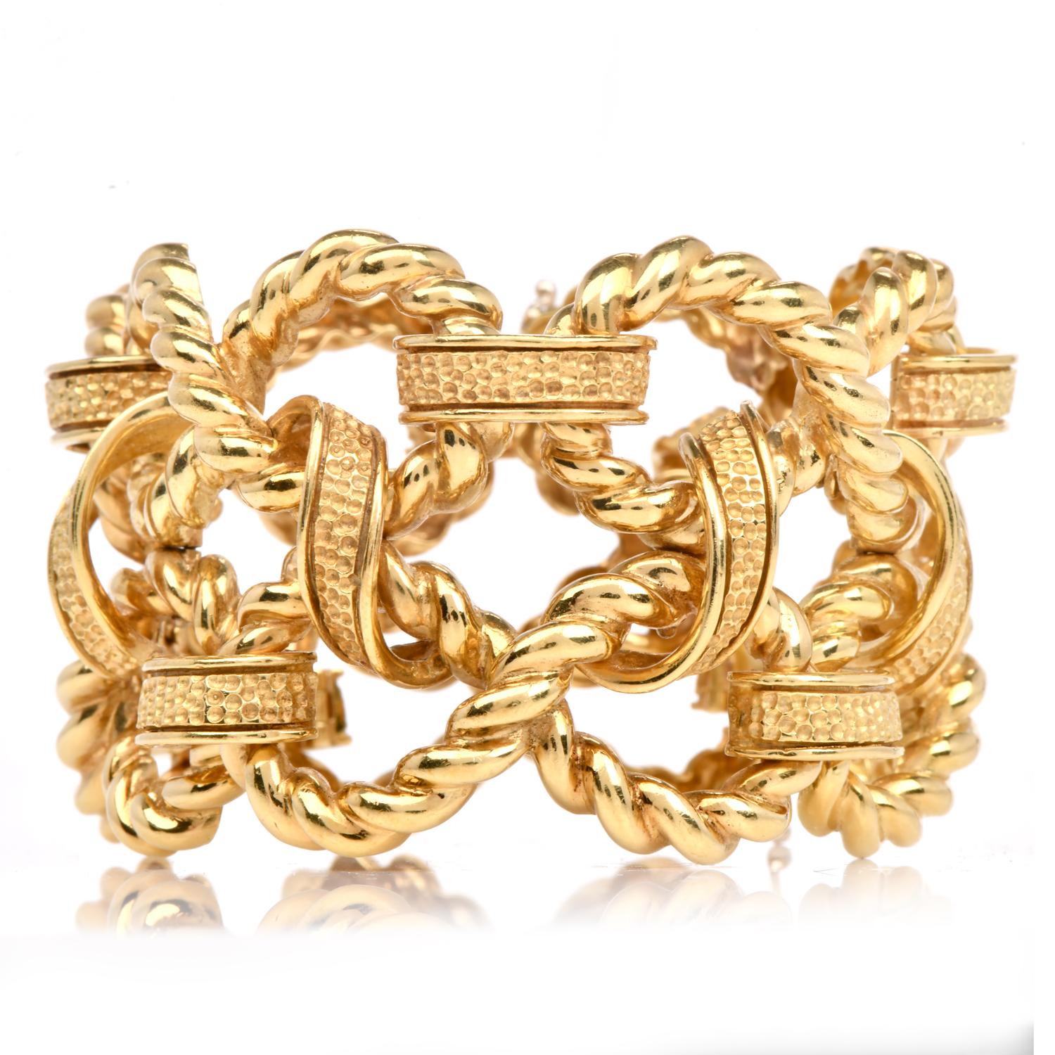 This Italian artistry late 1970 vintage bracelet is made in Heavy 18k yellow gold .

It boasts two rows of solid gold infinity links, masterfully woven together with a textured ribbon design, embodying eternal beauty and sophistication.

This