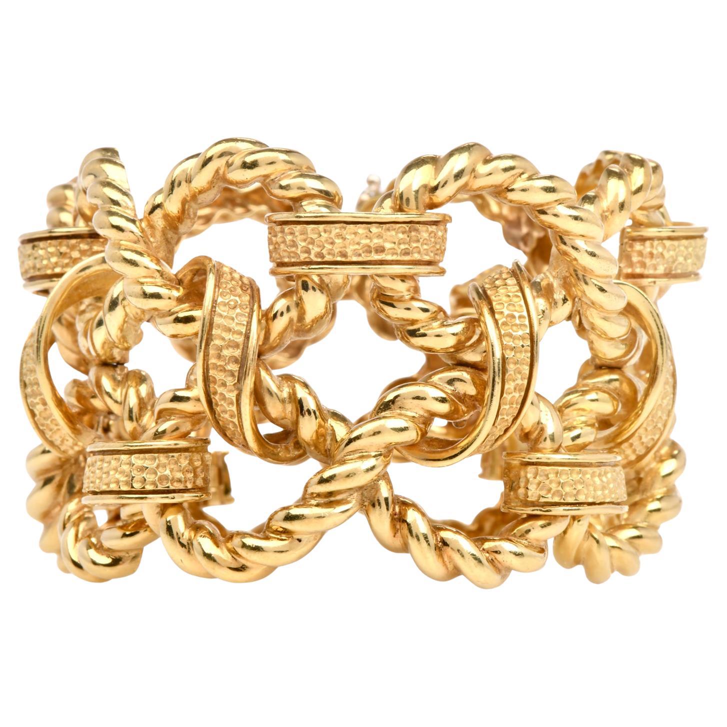 1970s Vintage Italian 18K Gold Infinity Link Textured Woven Statement Bracelet For Sale