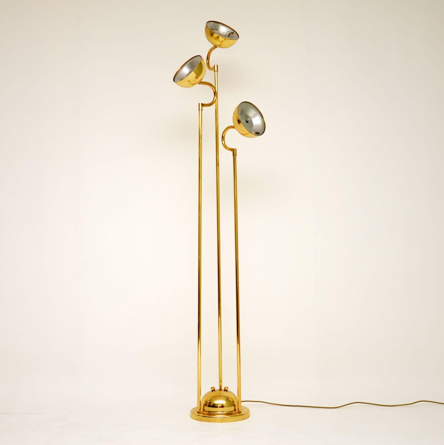 A beautiful vintage Italian brass floor lamp, this dates from circa 1970s-1980s. It has three independent heads that all tilt and swivel, the condition is great throughout, with only some extremely minor surface wear. This is in good working order,