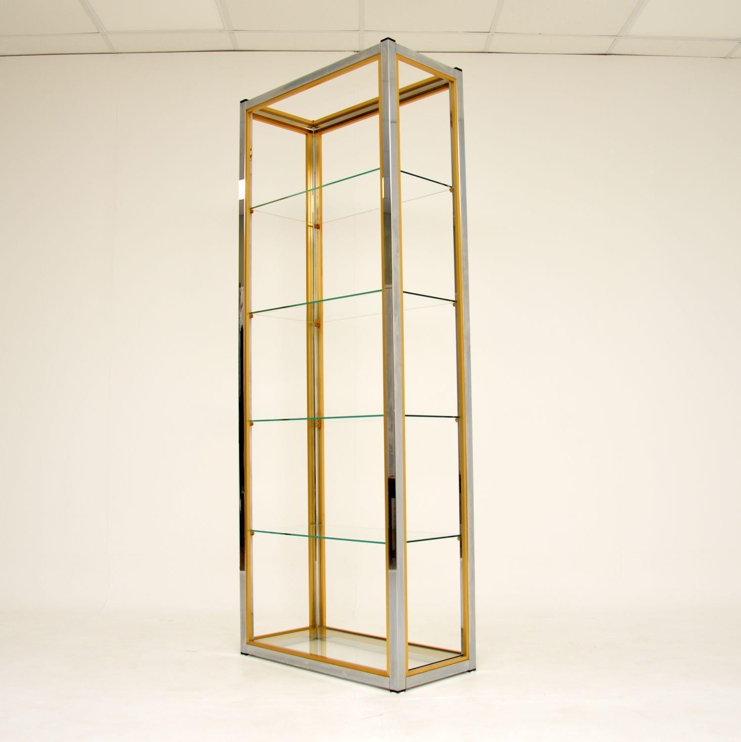 A stunning vintage Italian shelving unit in chrome and glass. This was designed by Renato Zevi for Zevi, it was made in Italy in the 1970’s.

The quality is fantastic, this is a very useful size and is finished all sides, so can be used as a free
