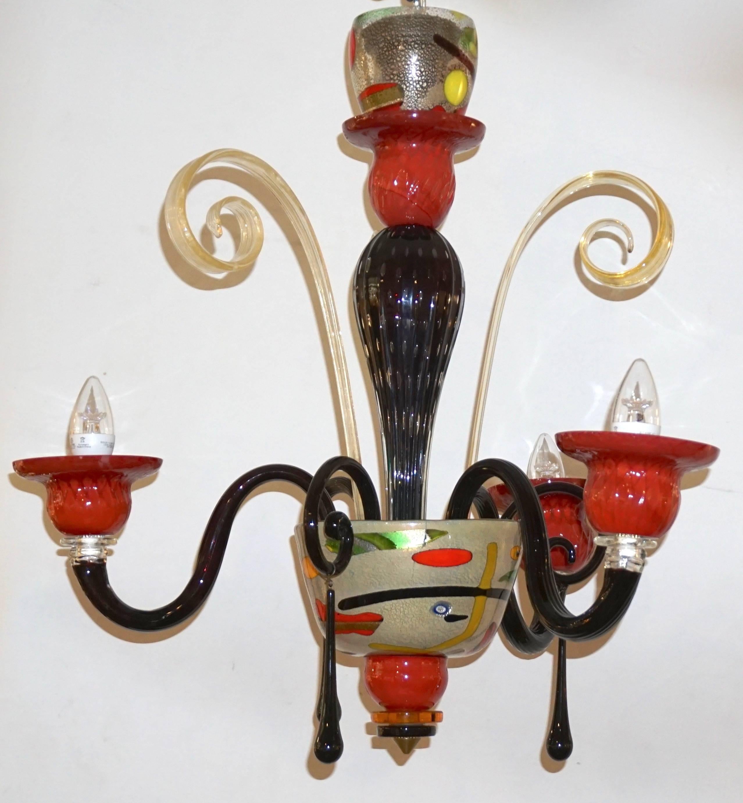 Mid-Century Modern rare one-of-a-kind Italian design chandelier with three arms, high quality of execution in blown Murano Art glass, showing Maestria in every detail of the spirited design with use of different elaborate techniques: the overlaid