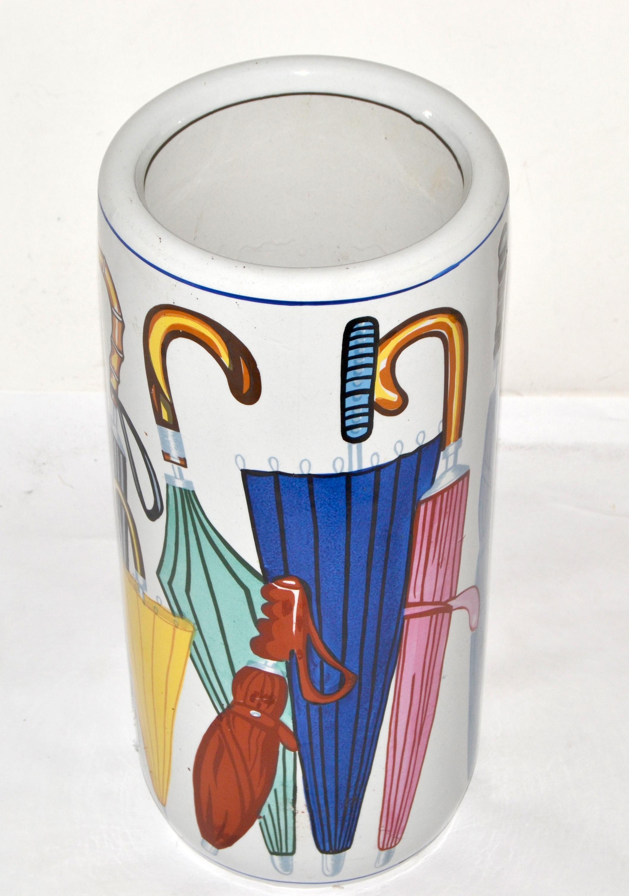 Italian Ceramic hand-painted colorful Umbrella Stand made in the late 1970s in the Style of Deruta.
In original Vintage condition with some wear inside due to History and use.
Faded Makers mark underneath.
Measures: 
Height: 18.25 inches.
Diameter: