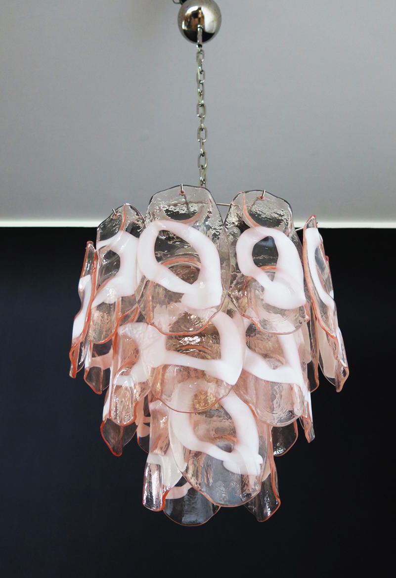 Vintage Italian Murano chandelier in Vistosi style. The chandelier has 23 fantastic Murano white and pink glasses (