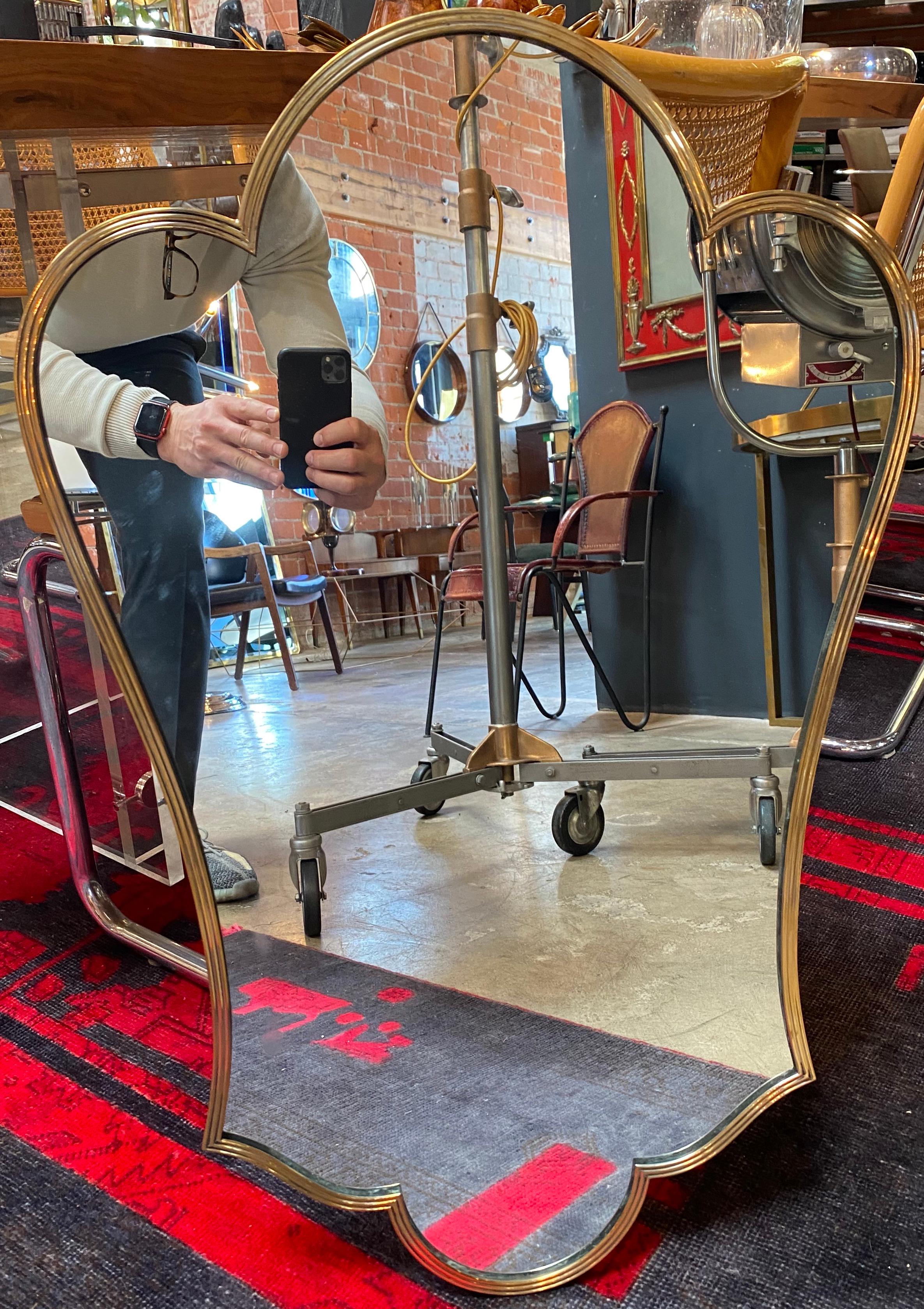 Beautiful and exclusive Italian wall mirror, made with brass frame, the mirror is in vintage conditions with original patina.
