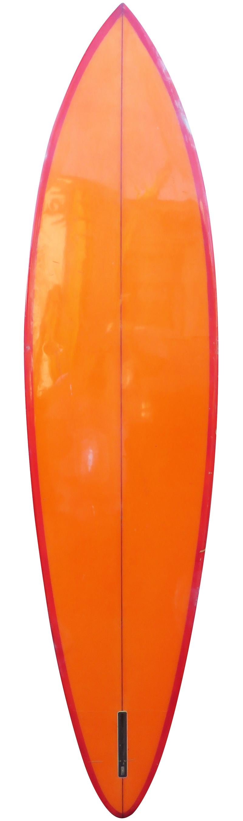 Late 1970s Jacks Surfboards pintail surfboard shaped by Rick Mchale. Features a beautiful red tint with white marbled deck, white pin striping, and orange tinted bottom. A fantastic example of a late 1970s vintage surfboard in all original