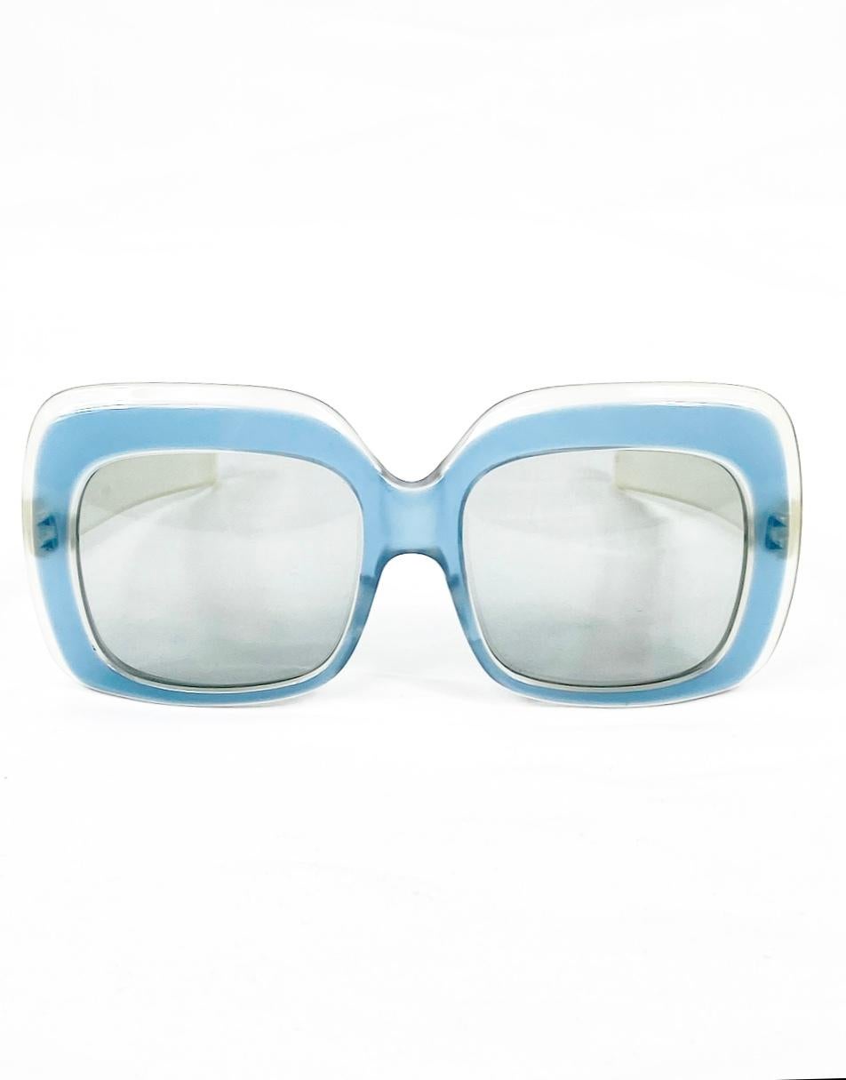 1970's Vintage JEAN PATOU Blue Square Sunglasses

Product details:
Large blue square frames, measures 6 inches wide by 2.5 inches high
The temples are clear white, measures 0.5 inch wide 
Made in France 
