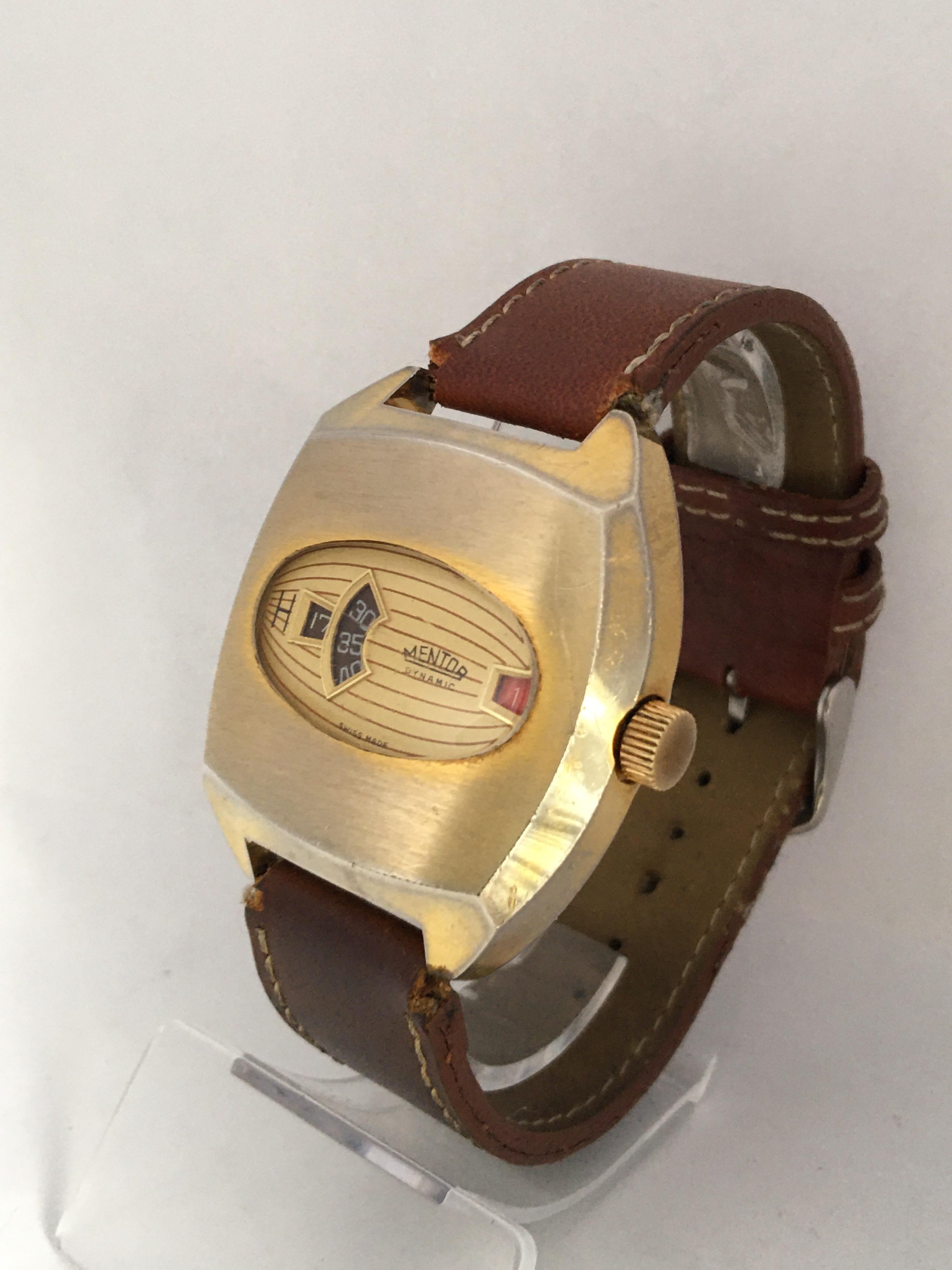 This charming vintage mechanical Digital Watch is working and it is ticking well. A good time keeping for its age. Visible signs of Ageing and used with some tarnished and scratches on the gold plated watch case and some scratches on the stainless