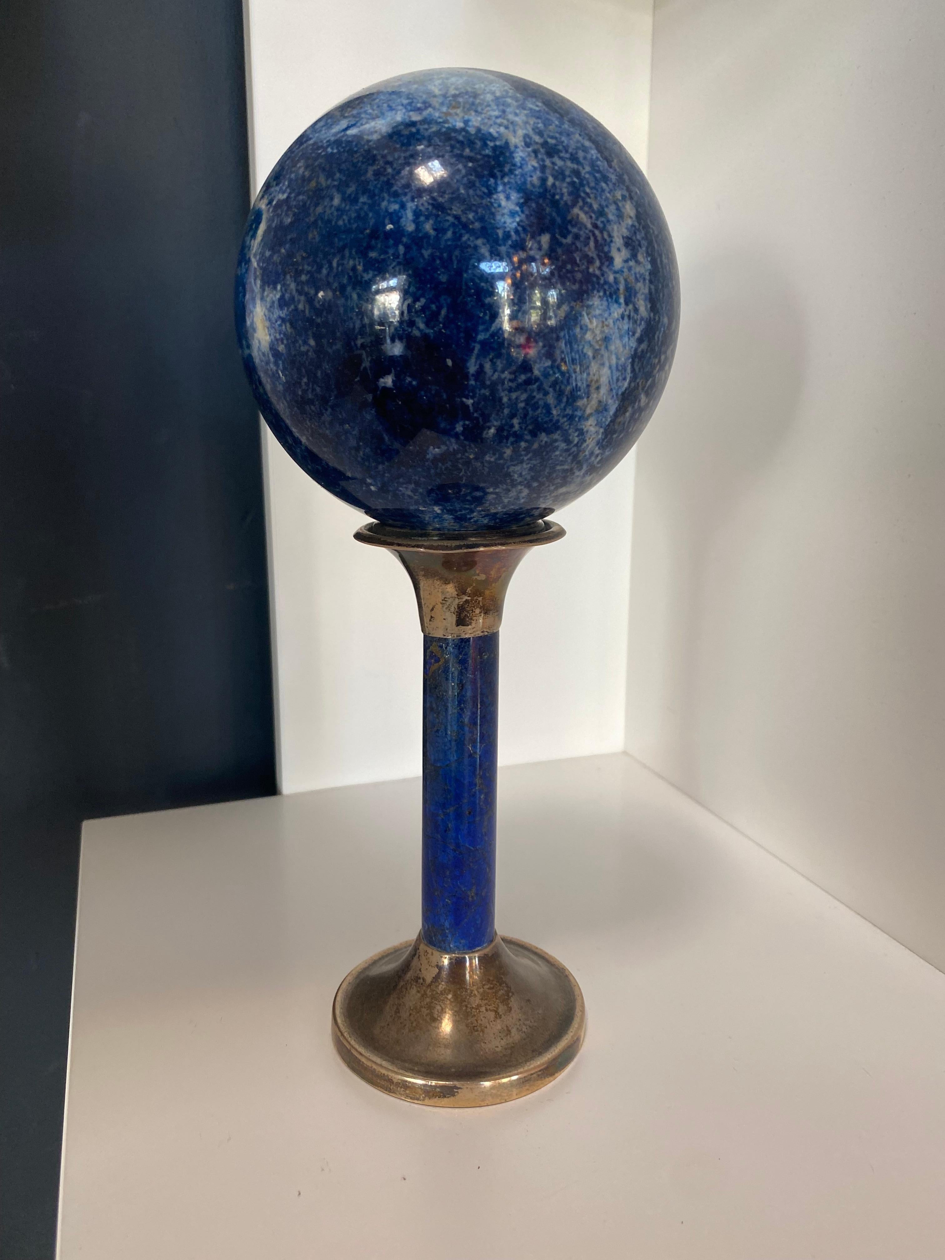 Beautiful Italian decorative lapis lazuli sphere with tall base.
Each piece is in a way unique and handcrafted in Italy. Slight variations in shape, color and size are to be considered a guarantee of a handcrafted creation.