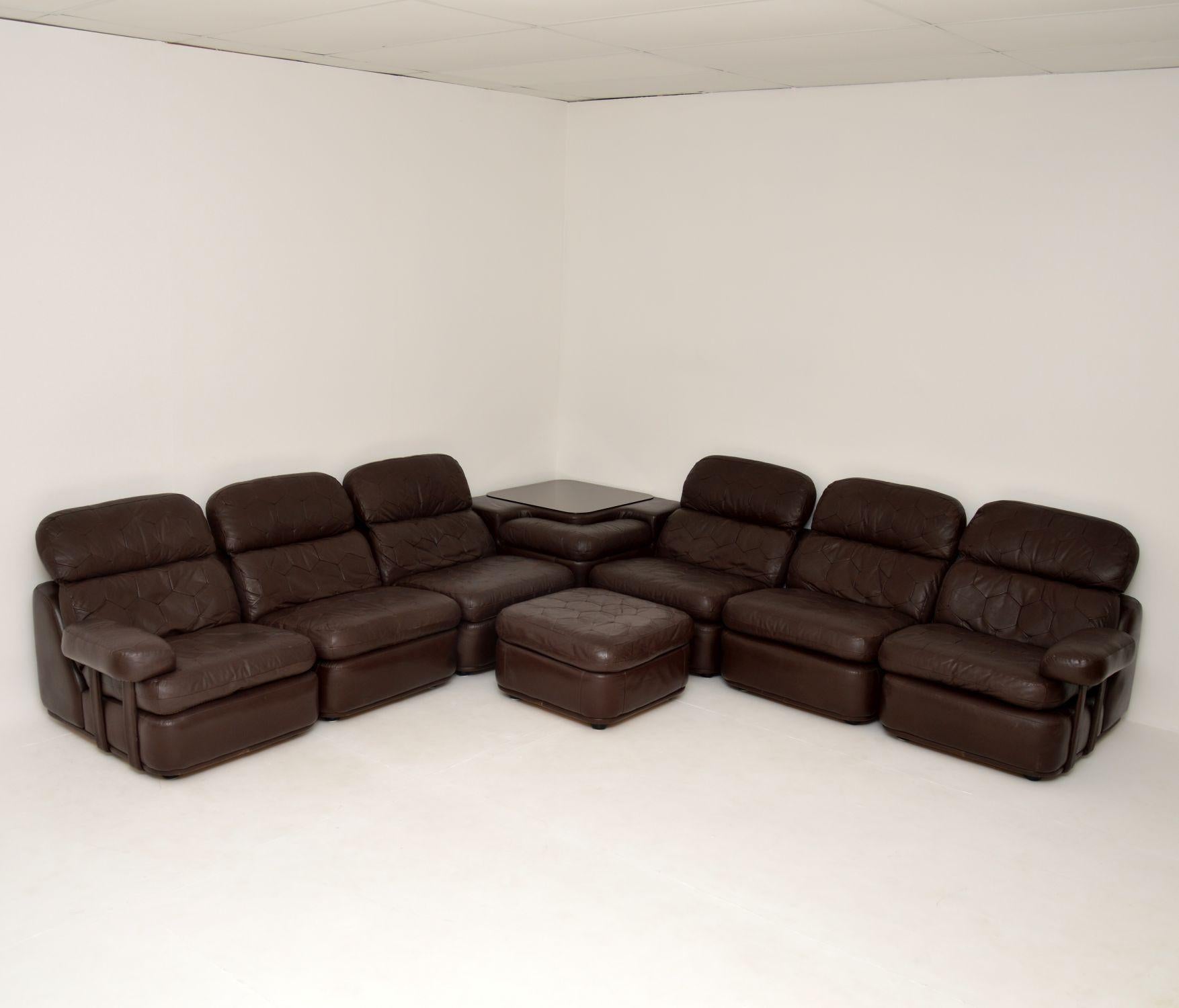 A beautiful, impressive and extremely comfortable vintage leather modular corner sofa suite. This was made in England, it dates from around the 1970’s.

This is of amazing quality and is very versatile. There are eight pieces including six chairs
