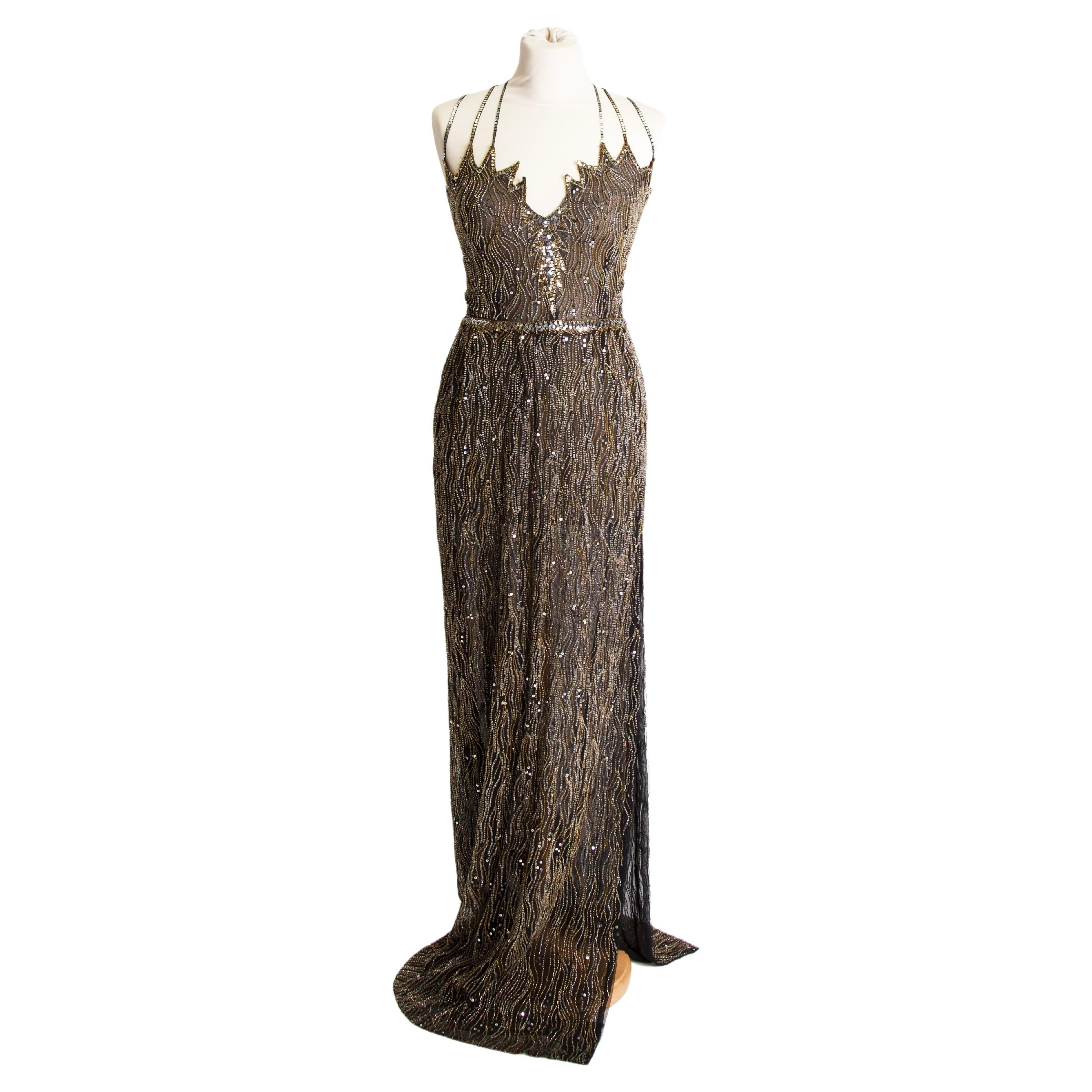 1970s Vintage long evening black dress studded with golden beads For Sale