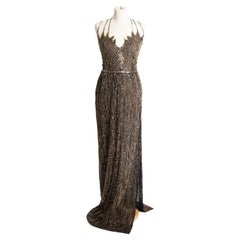 SPECIAL PRICE: 1970s Vintage long evening black dress studded with golden beads
