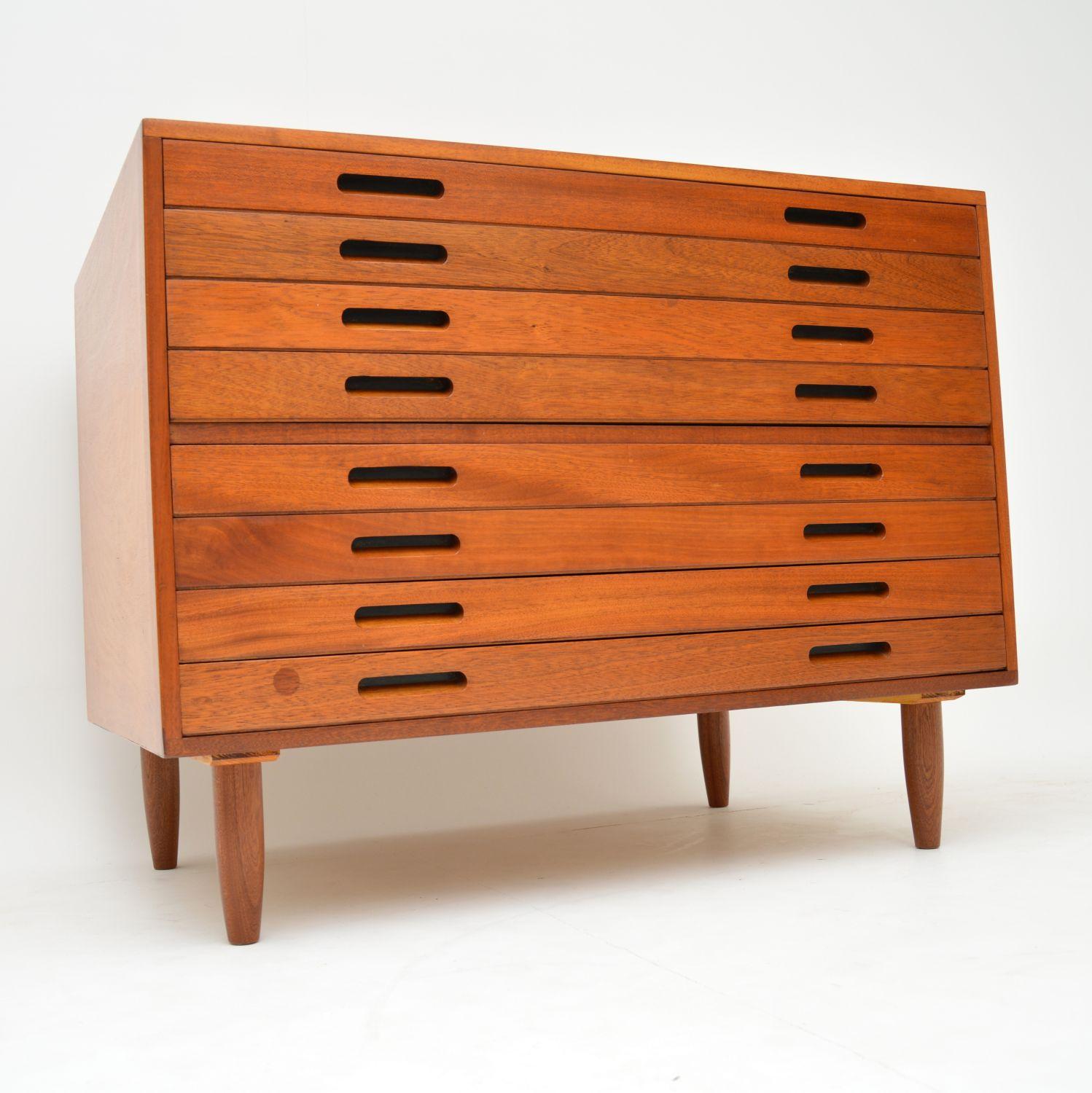 A stunning and very useful vintage architects plan chest, this dates from 1975, as is stamped on the back. This is made from mahogany, we have had it stripped and re-polished to a very high standard, we have also added the chunky tapered legs to
