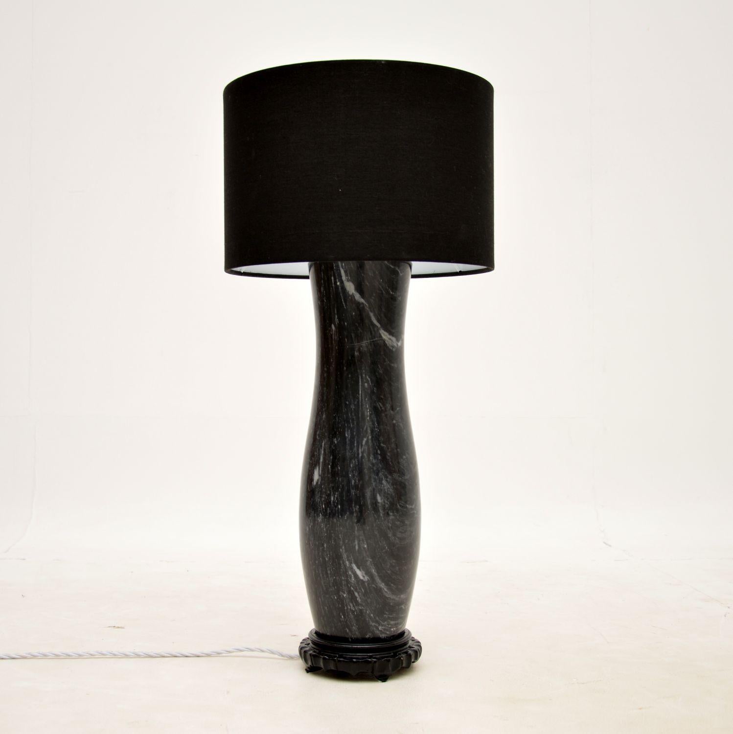 A beautiful solid marble vintage table lamp. This was likely made in Italy, it dates from around the 1970s-1980s.

It is of amazing quality and is a very impressive size. We have paired this with a modern black shade, and we have had this re-wired
