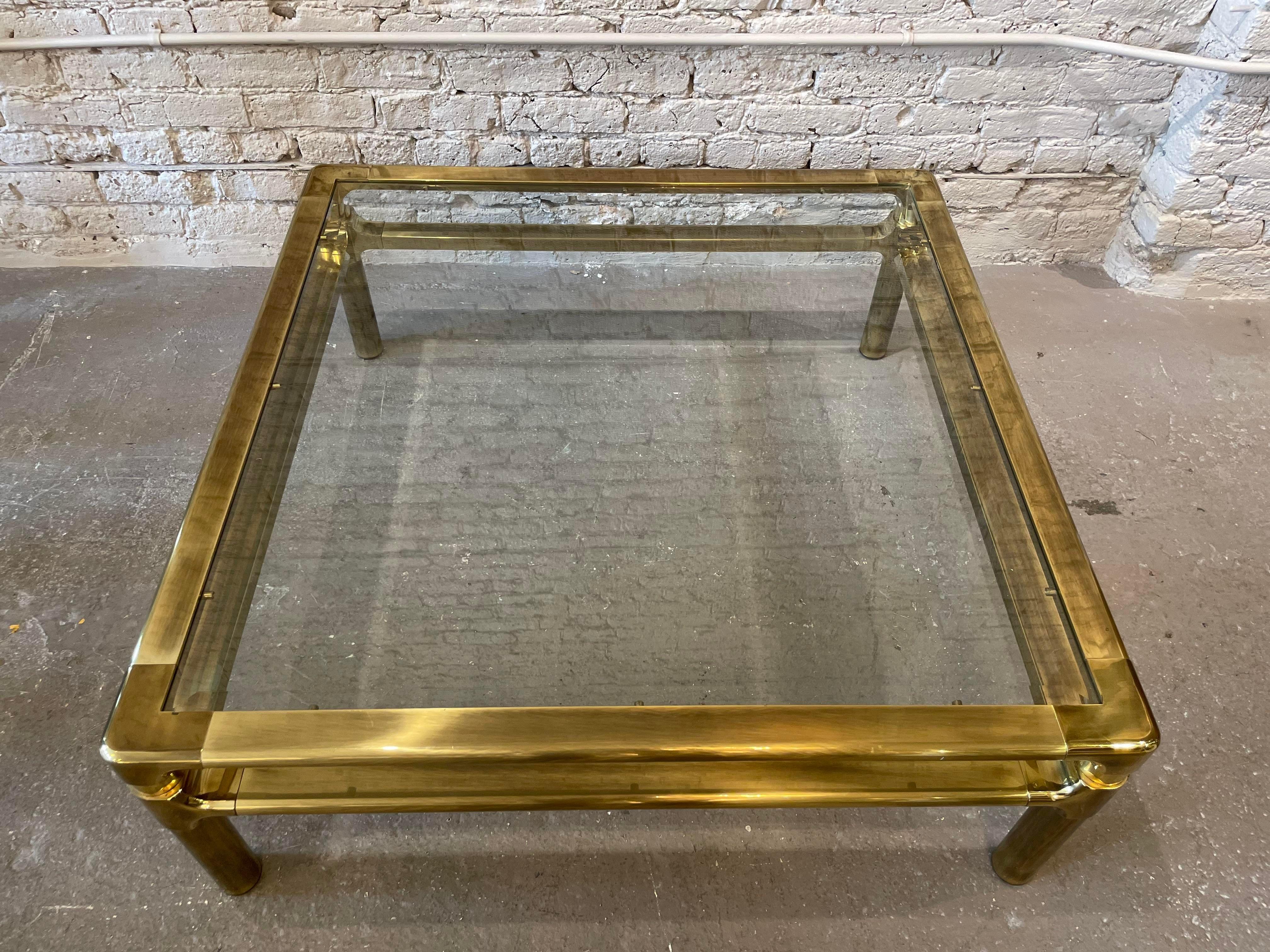 The brass is beyond! The table is simply stunning. The brass has the right amount of weight and patina but isn’t oxidized or rusted. The original glass is in good condition - no chips. A truly beautiful piece.

