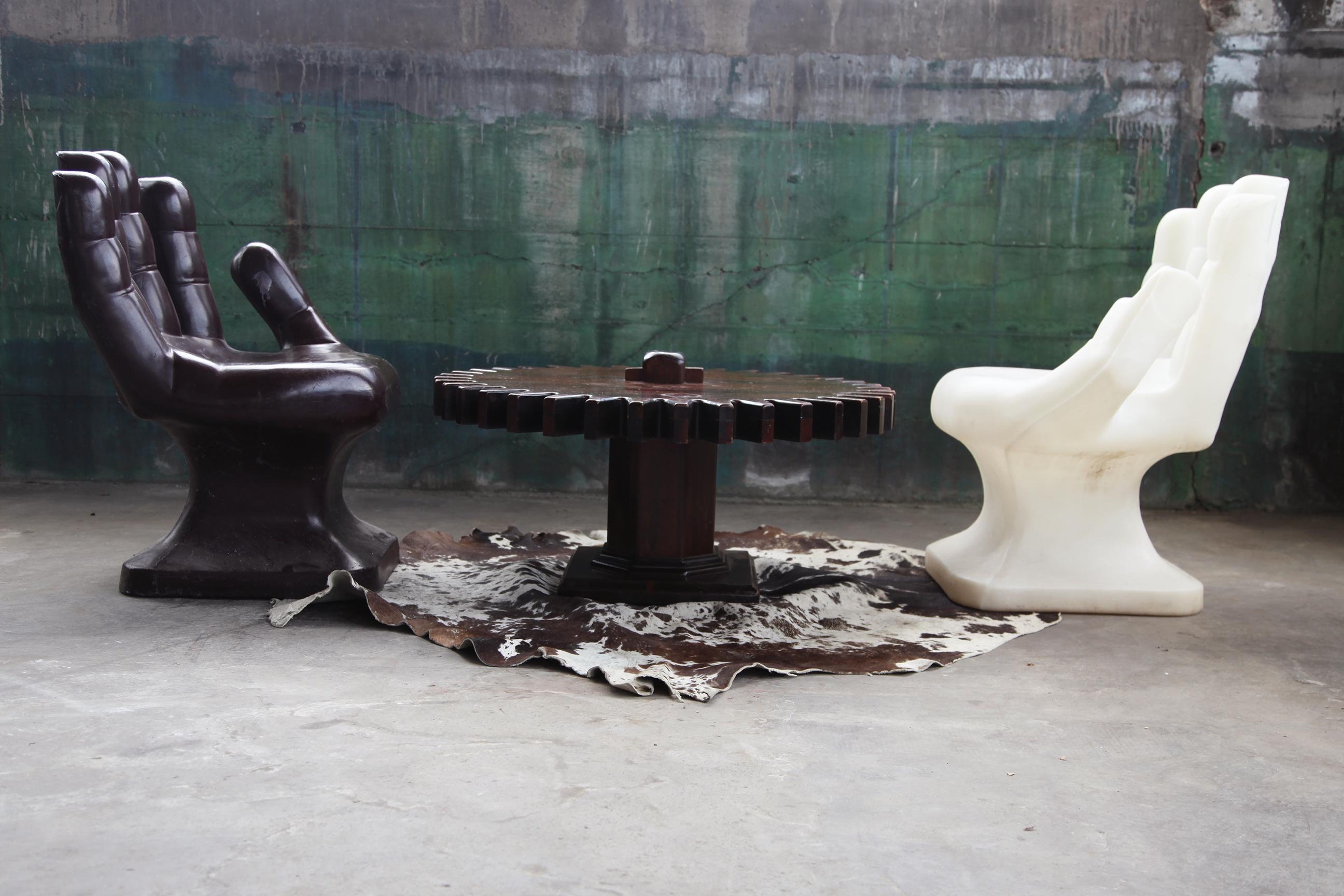 Excellent Prop piece, or a Living Room, studio or office POP!

This listing is for the Dark Brown chair. We also have a White chair, sold separately, pictured here.

The RMIC hand chair made its first appearance around the year 1970. The spectacular