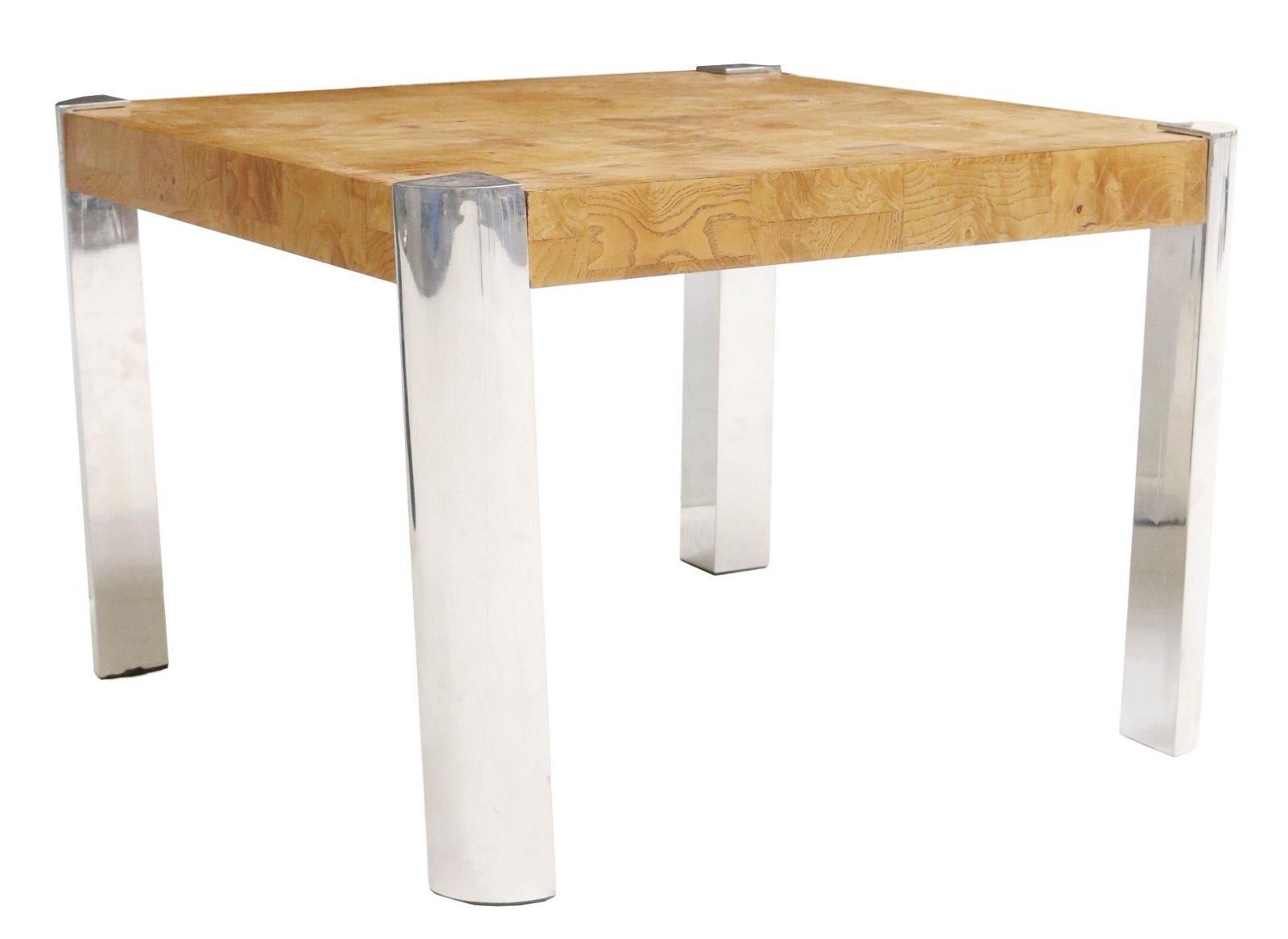 Modern coffee table, in the manner of Milo Baughman (American, 1923-2003) for Pace Collection, c.1970s-1980s, burlwood tabletop, chrome finish legs.

The Pace Collection was a contemporary high-end furniture company from 1960 to 2001. It was founded
