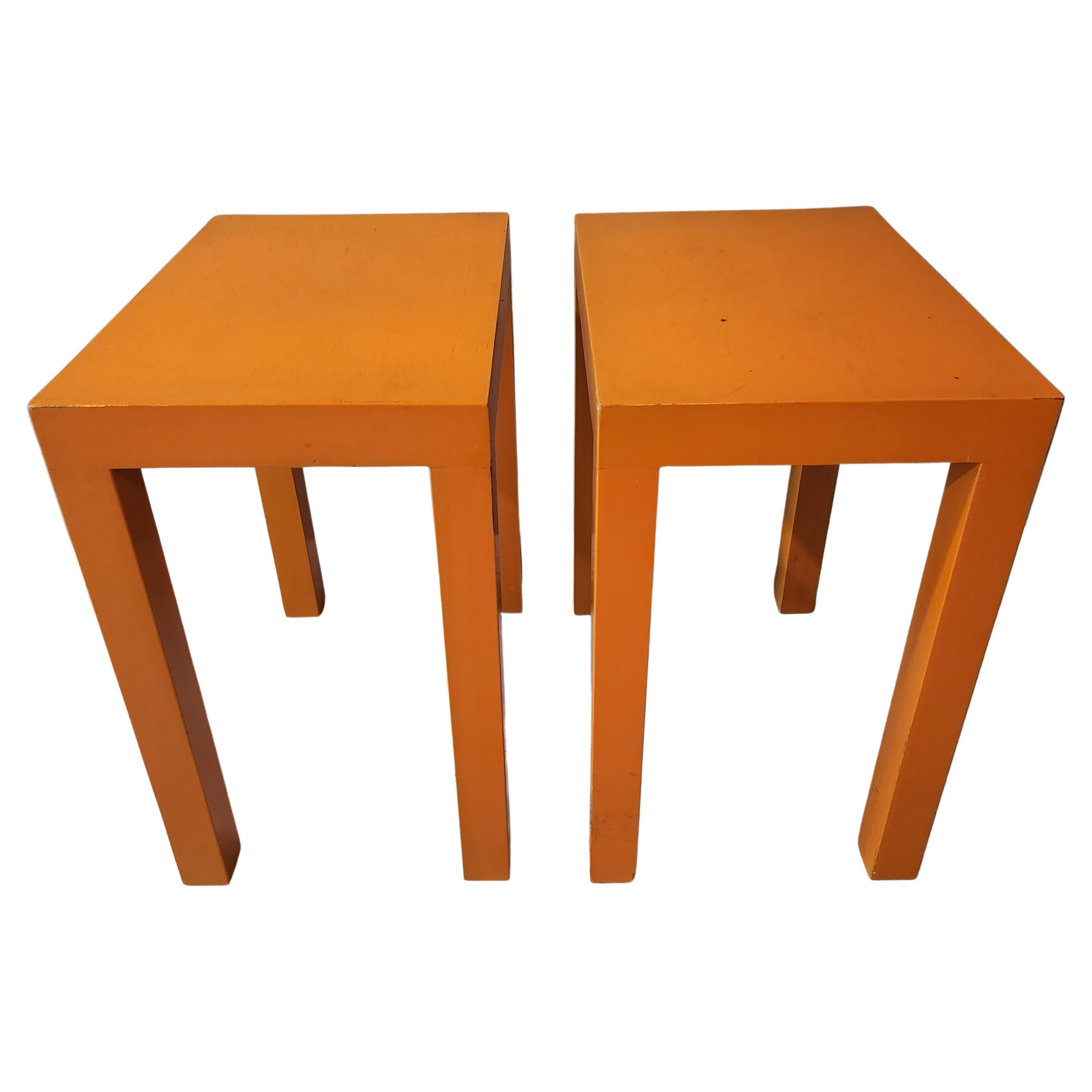 Parsons table pair
1970s Vintage Modern orange wood parsons side accent tables.
Exudes rectangular optical excitement.
Mid-Century Modern design after Jean Michel Frank minimalist Parsons design.
Measures: 23 tall x 14 wide x 20 deep.
Tables